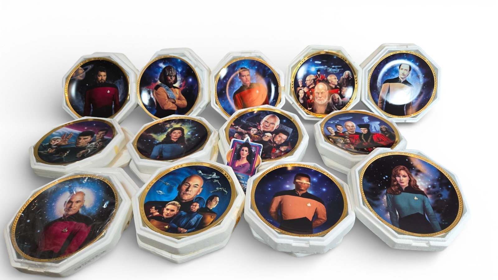 Hamilton Collection Star Trek: The Next Generation Collector Plates: A collection of octagonal porcelain collector plates produced by The Hamilton Collection as part of the Star Trek: The Next Generation Plate Collection. Each plate features a full-color transfer-print