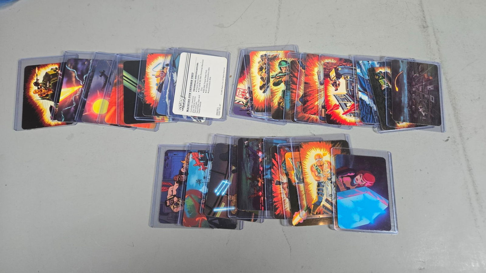 A group of Individually Bagged Vintage G.I. Joe Action Figures and Collector Cards - 12