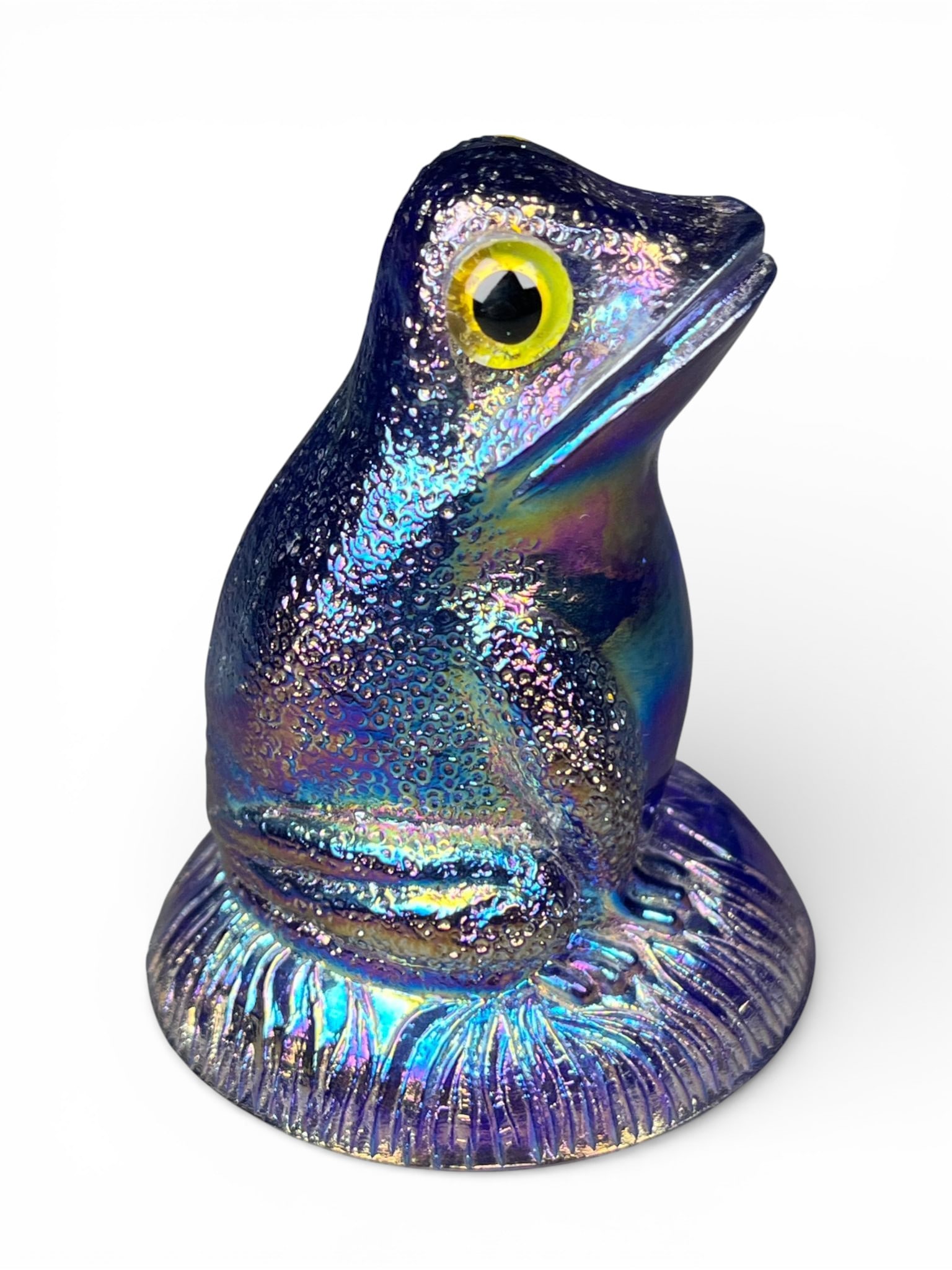 Fenton Carnival Glass Iridescent Frog Figurine: A novelty figurine attributed to Fenton, executed in the Carnival Glass style. The piece is crafted from molded glass in a deep cobalt or purple hue, featuring an intense iridescent finish that