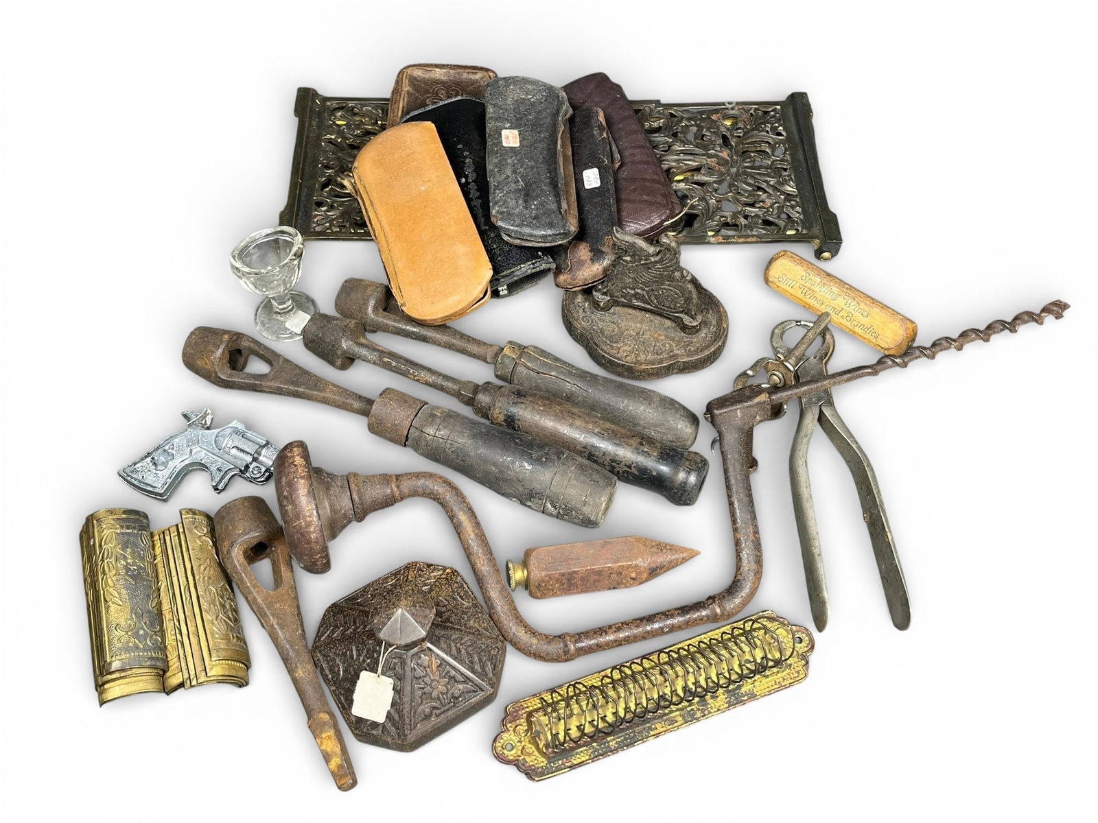 Antique Woodworking and Layout Tools Lot: Brace, Auger Handles, Plumb Bob, and Farrier's Nippers: Comprehensive lot of antique and vintage hand tools, primarily dating from the late 19th to early 20th century. Includes a heavy iron hand brace drill with a wooden mushroom handle knob and a fixed