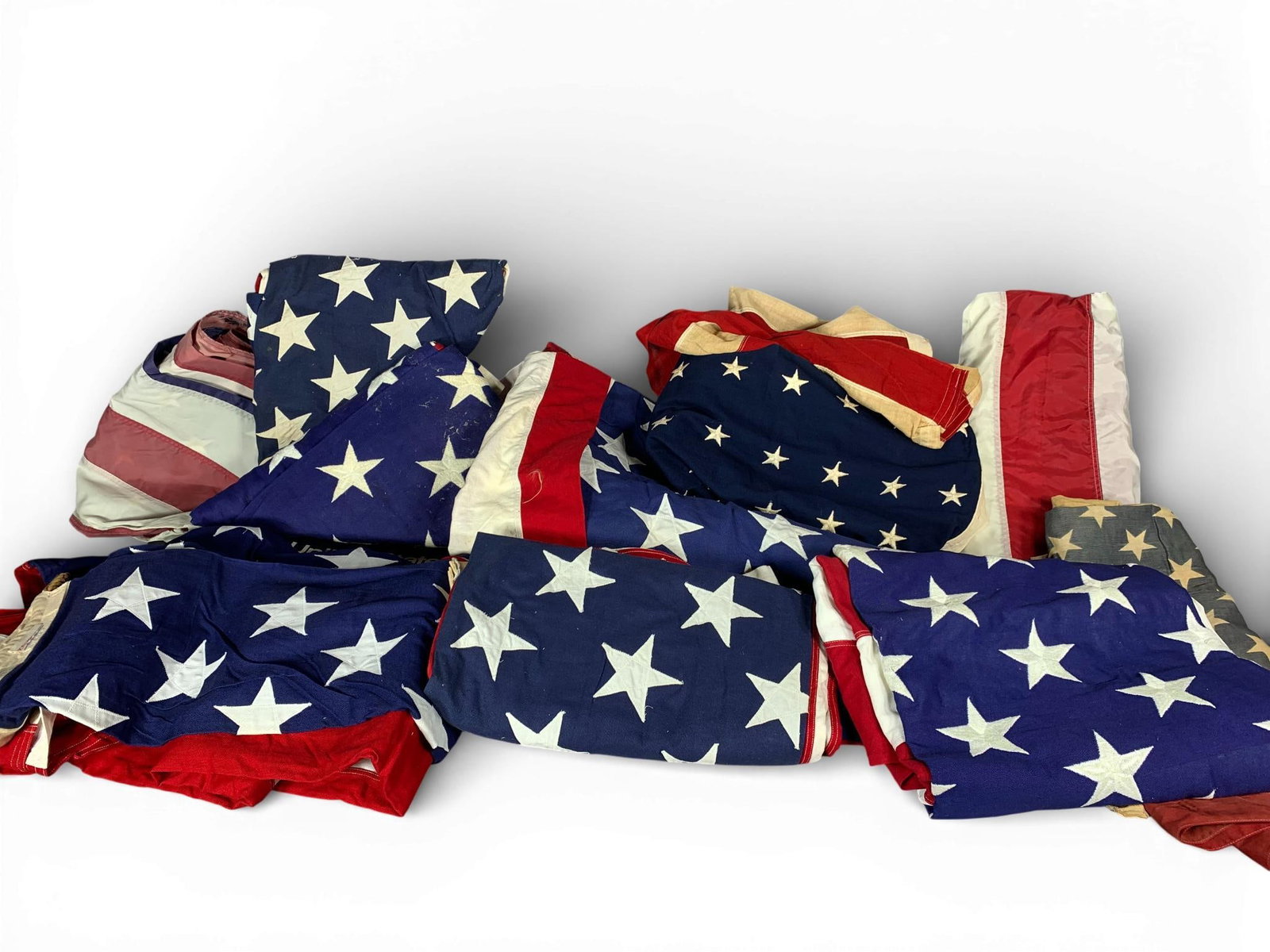 A Collection of 12 United States Flags including Valley Forge Flag Co. and NYL-GLO (1 of 20)
