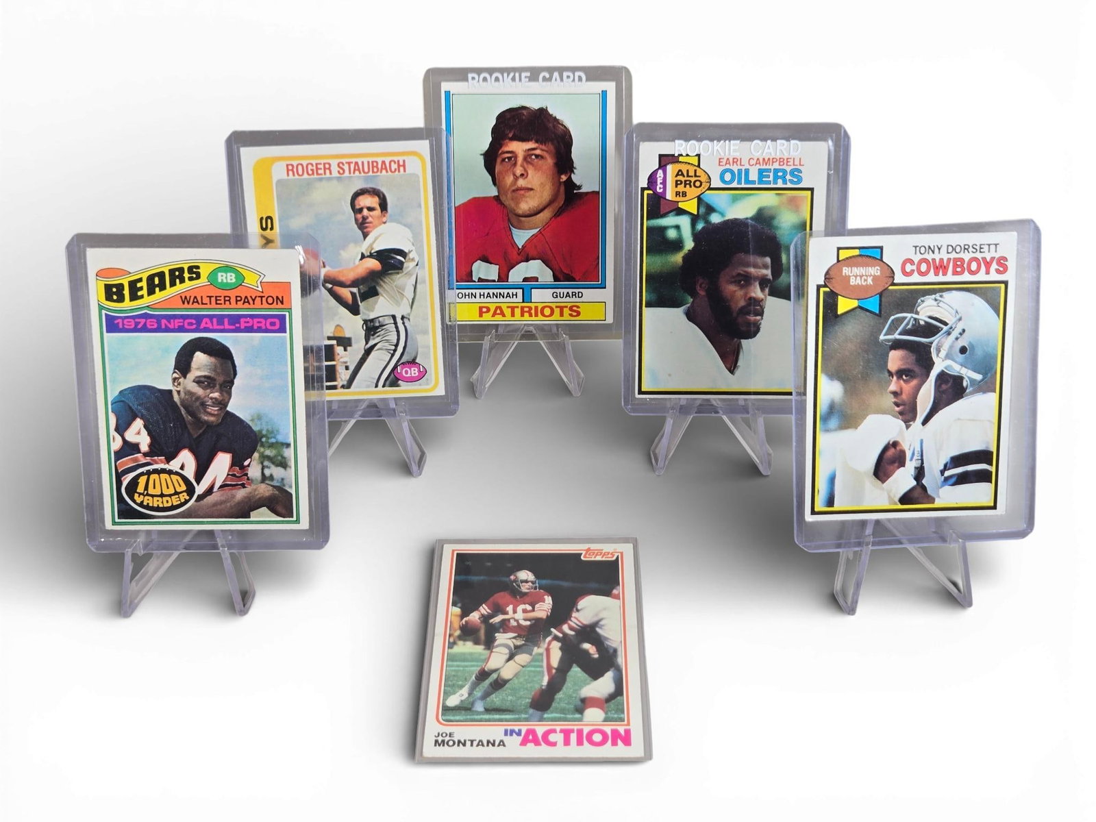 Football Rookies & Star lot: Campbell, Staubach, Hannah, Payton, Montana: Dorsett. EX. Burns in-house shipping is available. Pick up is Saturday, Feb. 28 from 10 am to 4 pm at our gallery in Lancaster, Ohio 43130 or we will provide in-house shipping for this item. We will c
