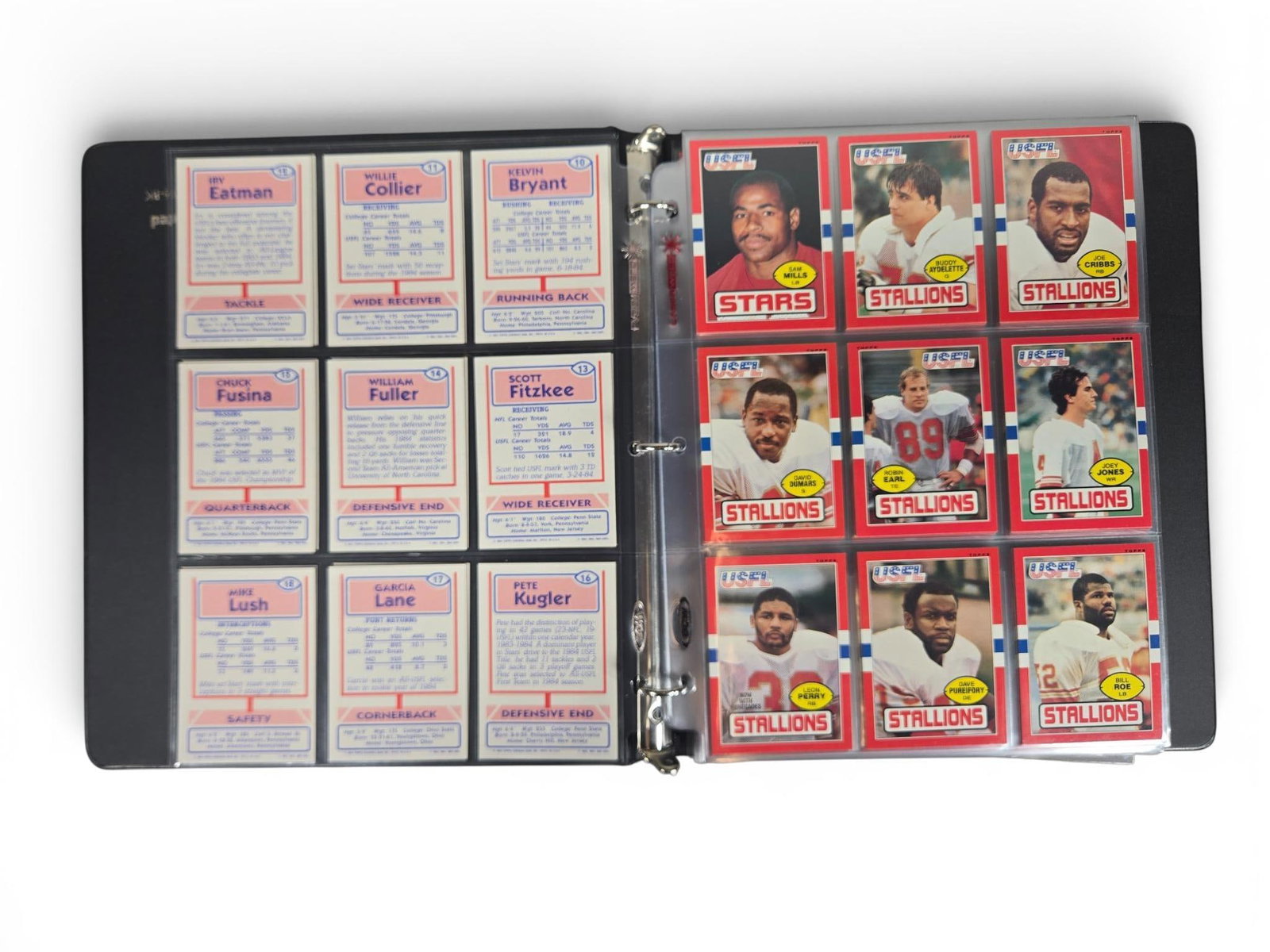 1985 USFL complete set w/ Rookies in a binder, with factory box: EX-NM. Burns in-house shipping is available. Pick up is Saturday, Feb. 28 from 10 am to 4 pm at our gallery in Lancaster, Ohio 43130 or we will provide in-house shipping for this item. We will charge