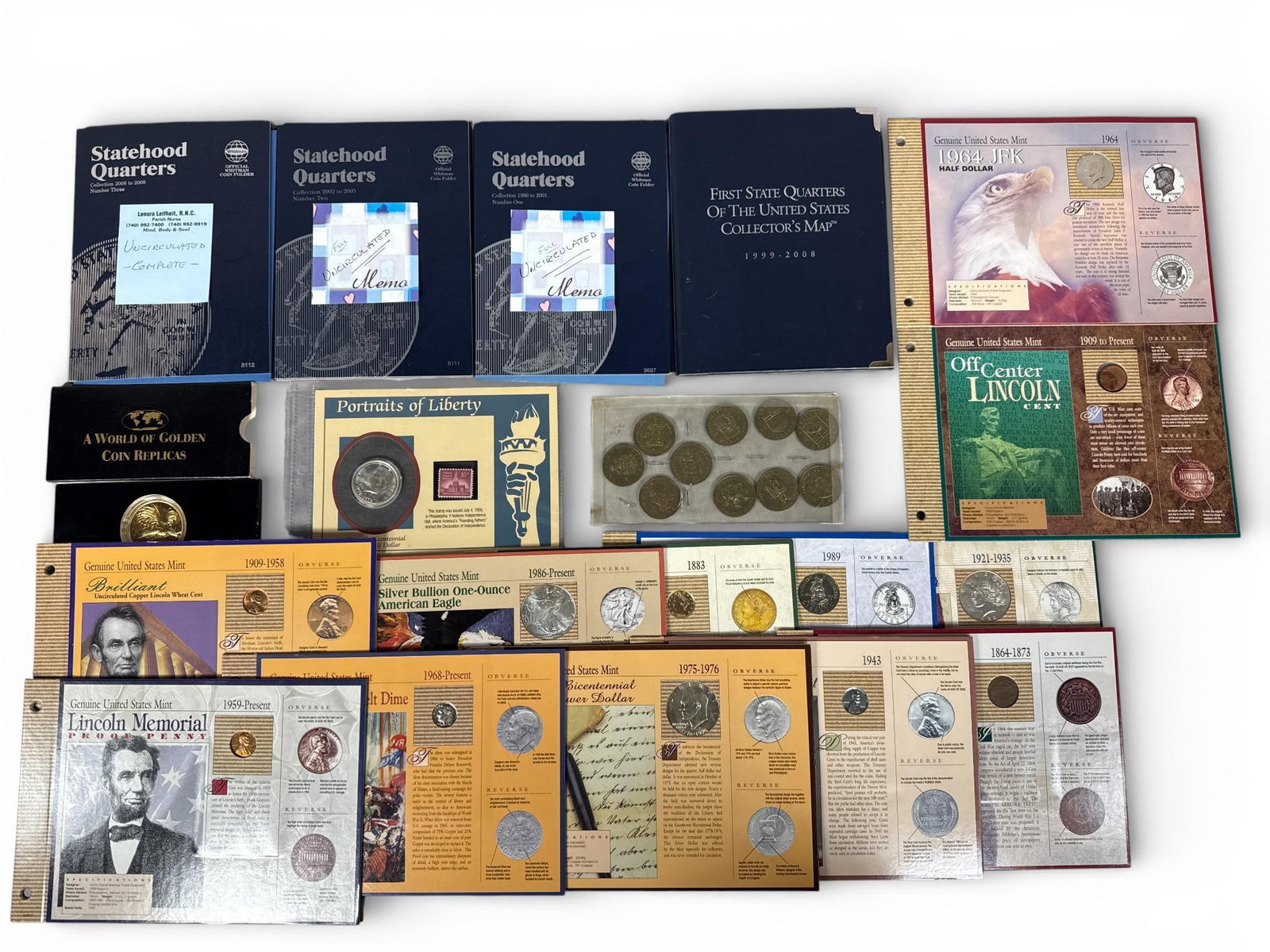 A Collection of United States and International Coins, Commemorative Sets, and Whitman Folders: This lot consists of a diverse numismatic collection featuring United States and international specimens. The group includes three Whitman official coin folders for Statehood Quarters covering the yea