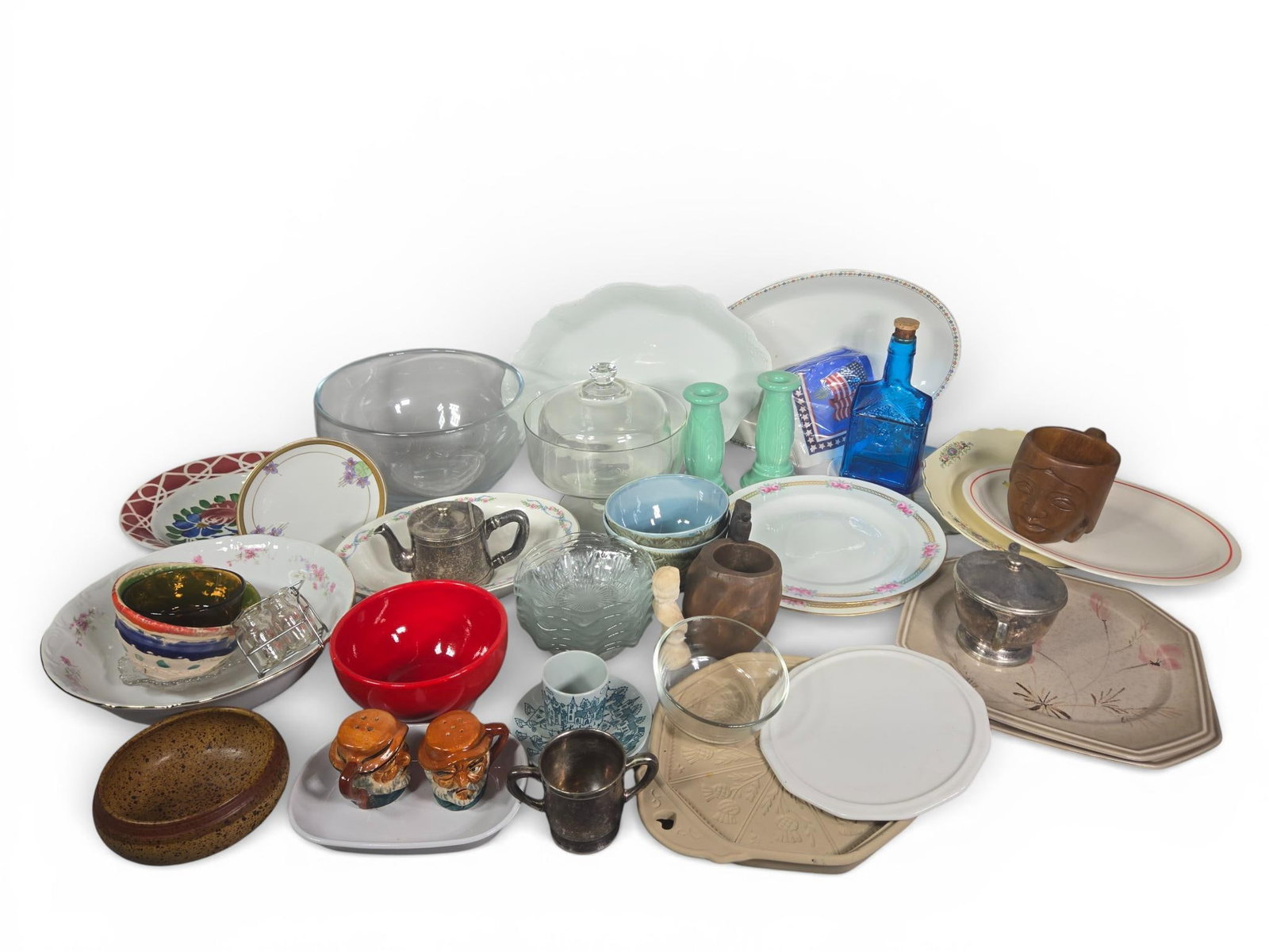 An Assortment of Ceramic, Glass, and Metal Tableware and Decorative Items including Mikasa,: This collection comprises various kitchenware and decorative objects. Ceramic items include octagonal plates in the Mikasa Innovation Genie pattern (DS 801), a Nymolle Art Faience cup and saucer featu
