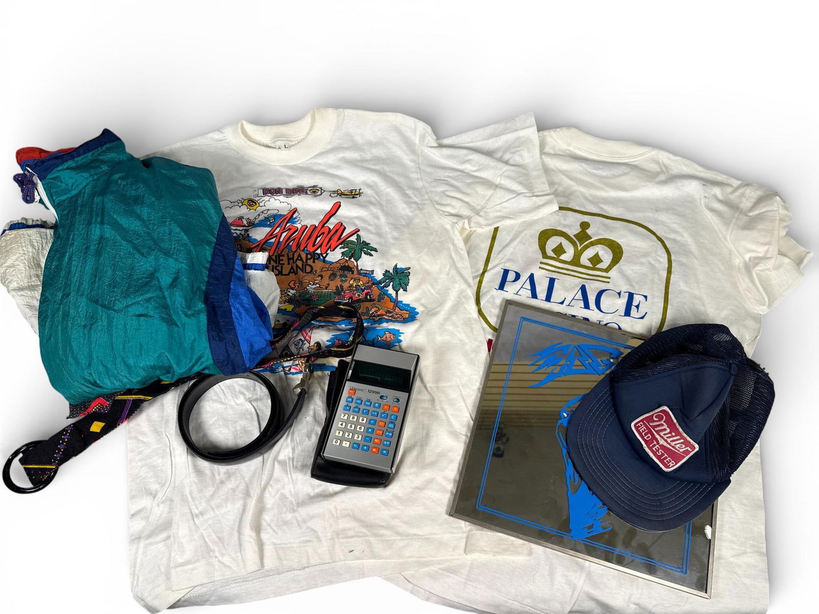 Unisonic, Miller, Playboy, Vintage Collectibles and Apparel Lot, Various Materials, 1980s-1990s: This collection features a variety of original vintage items from the late 20th century. Included is a Unisonic 1299R scientific calculator with a brushed metal faceplate and protective slipcase, acco