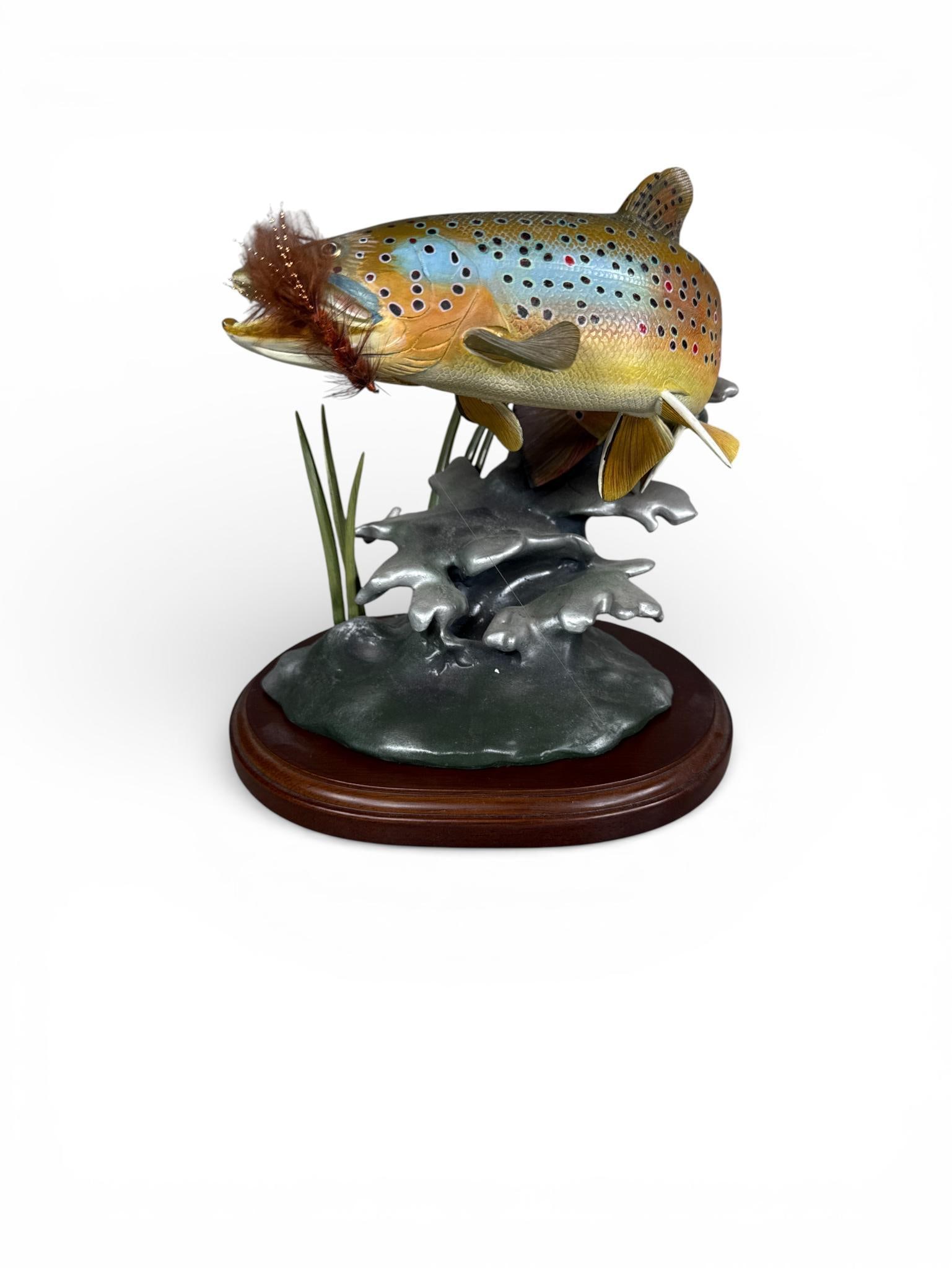 Franz Dutzler Noble Brown Trout Sculpture for The Danbury Mint: A hand-painted wildlife sculpture titled Noble Brown by artist Franz Dutzler, produced exclusively for The Danbury Mint. The piece depicts a brown trout leaping from splashing water with an artificial