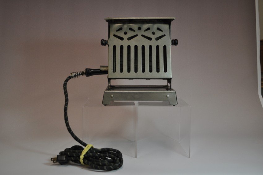 Antique Toaster: Merion Model 66.: 8.25” high. Shipping 12. Note: If you are interested in seeing a short video of these toasters from multiple perspectives, please go to YouTube and search: "adrian burns" + "toasters"