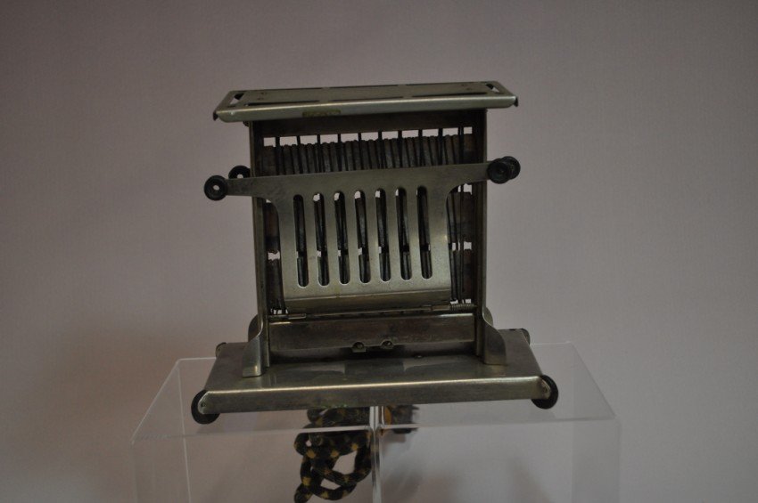 Antique toaster: Universal.: 6 3/4” tall. Shipping 15. Note: If you are interested in seeing a short video of these toasters from multiple perspectives, please go to YouTube and search: "adrian burns" + "toasters"