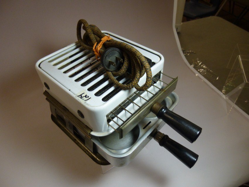 Antique toaster: Armstrong Table Stove.: Porcelain enamel. Shipping 15. Note: If you are interested in seeing a short video of these toasters from multiple perspectives, please go to YouTube and search: "adrian burns" + "toasters"