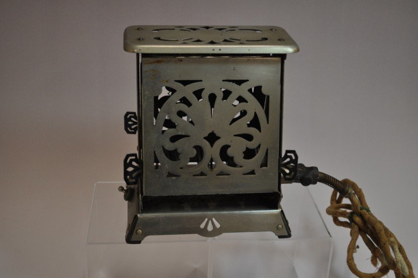 Antique toaster: Hotpoint.: Pat. 1914. Elaborate style. 8” tall. Shipping 15. Note: If you are interested in seeing a short video of these toasters from multiple perspectives, please go to YouTube and search: "adrian burns" + 
