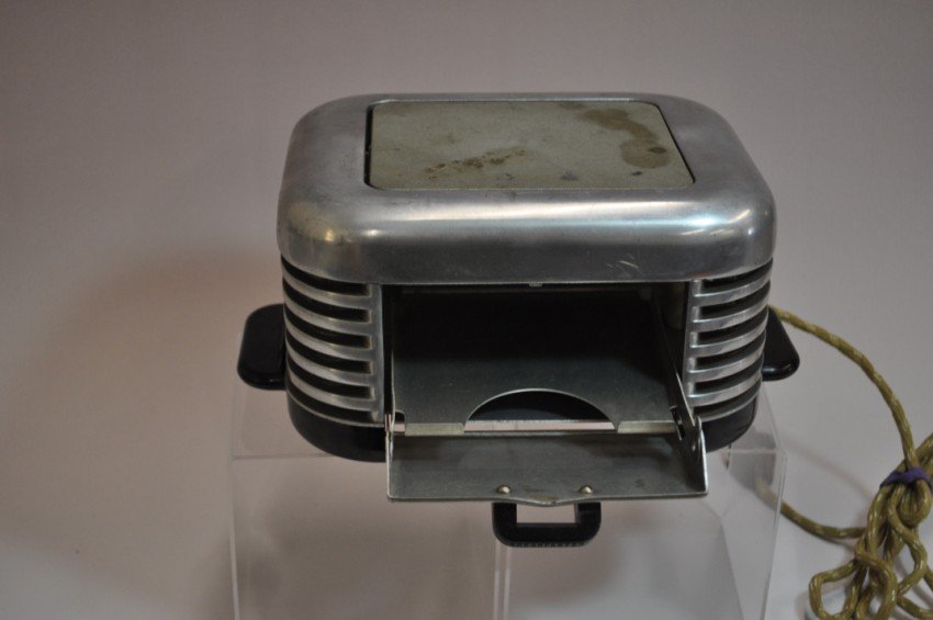 Art Deco Style Antique Toaster: Breakfaster.: Height: 5” Width: 11” Note: If you are interested in seeing a short video of these toasters from multiple perspectives, please go to YouTube and search: "adrian burns" + "toasters"