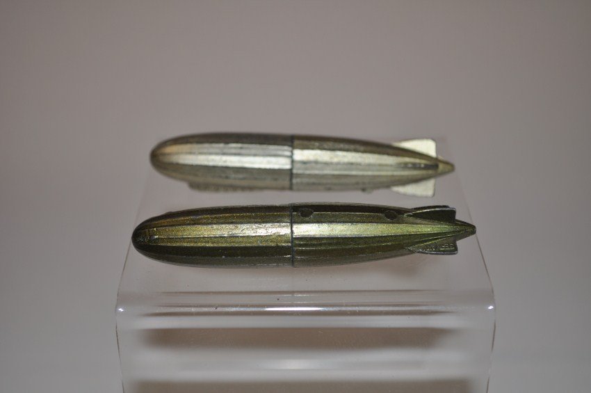 Rare Antique Figural Toy Pencil Sharpeners – Zeppelins: Both marked Germany. 2 7/8” long. Shipping 8.