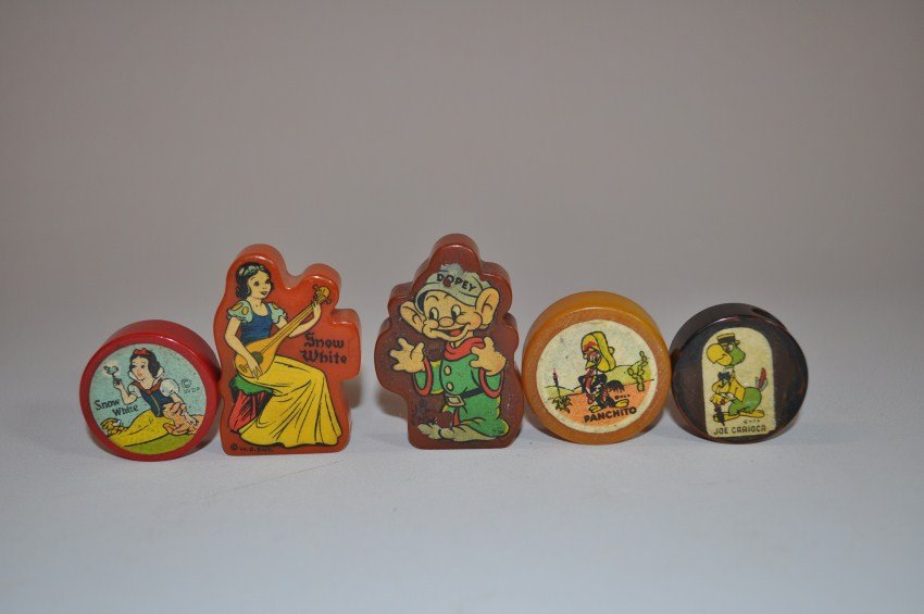 5 Rare Bakelite Disney, Cartoon Etc. Pencil Sharpeners: Snow White (x3), Panchito, Joe Carioca. A rare lot. Largest is 1.75” high. Shipping 8.