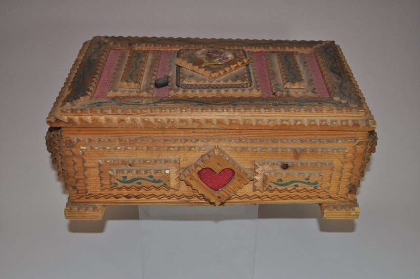 Large tramp art box with elaborate decoration.: 14”w x 5.5”h. Shipping 20.