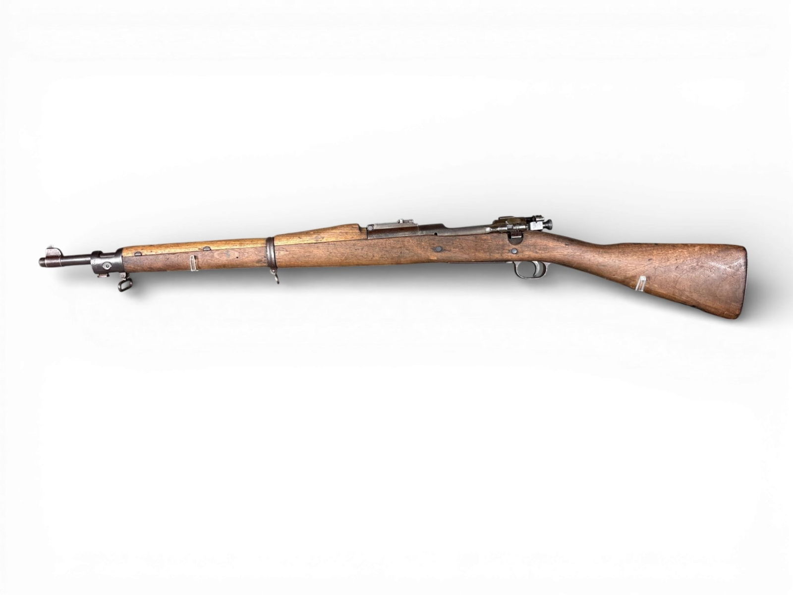 ** Remington Model 1903 Bolt Action Rifle: This Remington Model 1903 bolt-action rifle is chambered in .30-06 Springfield and carries serial number 3246055. The receiver is stamped U.S. REMINGTON MODEL 1903. The firearm features a 24.75-inch