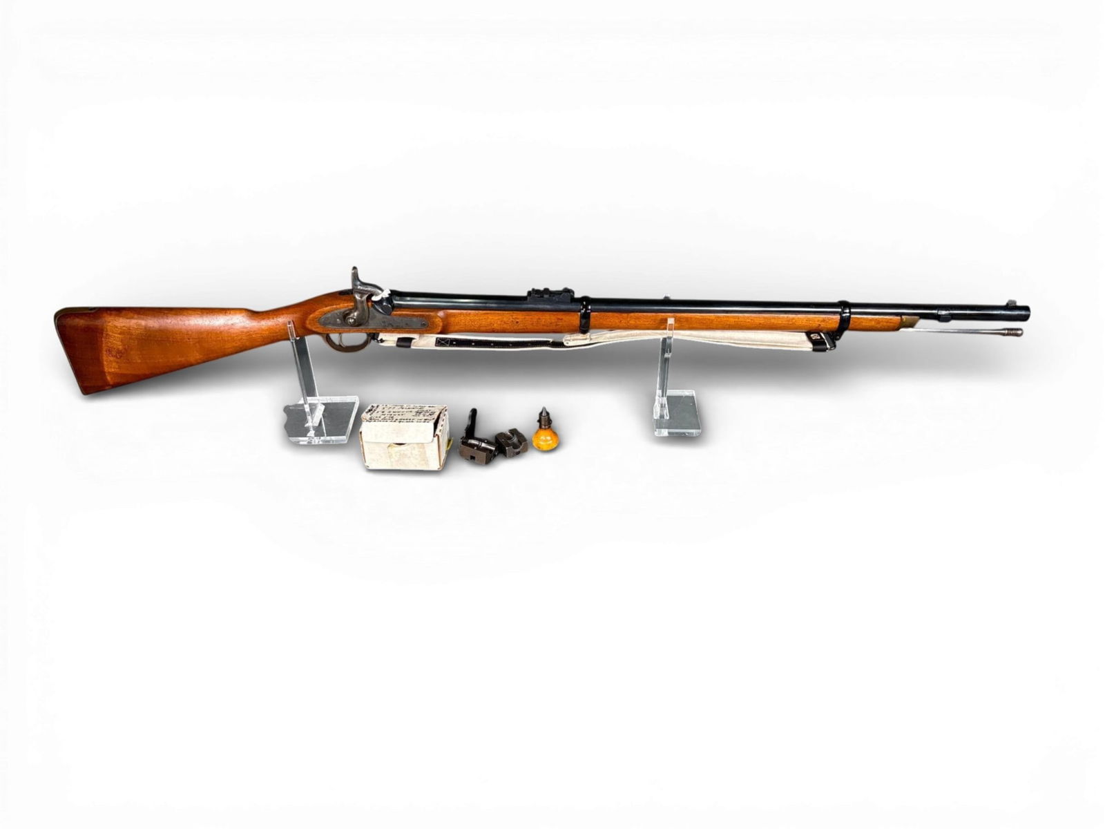 Parker-Hale Enfield 1858 Pattern Percussion Rifle with Accessories: A Parker-Hale reproduction of the 1858 pattern Enfield percussion rifle. The firearm features a 33-inch blued steel barrel and a full-length walnut stock. The furniture is constructed of brass,