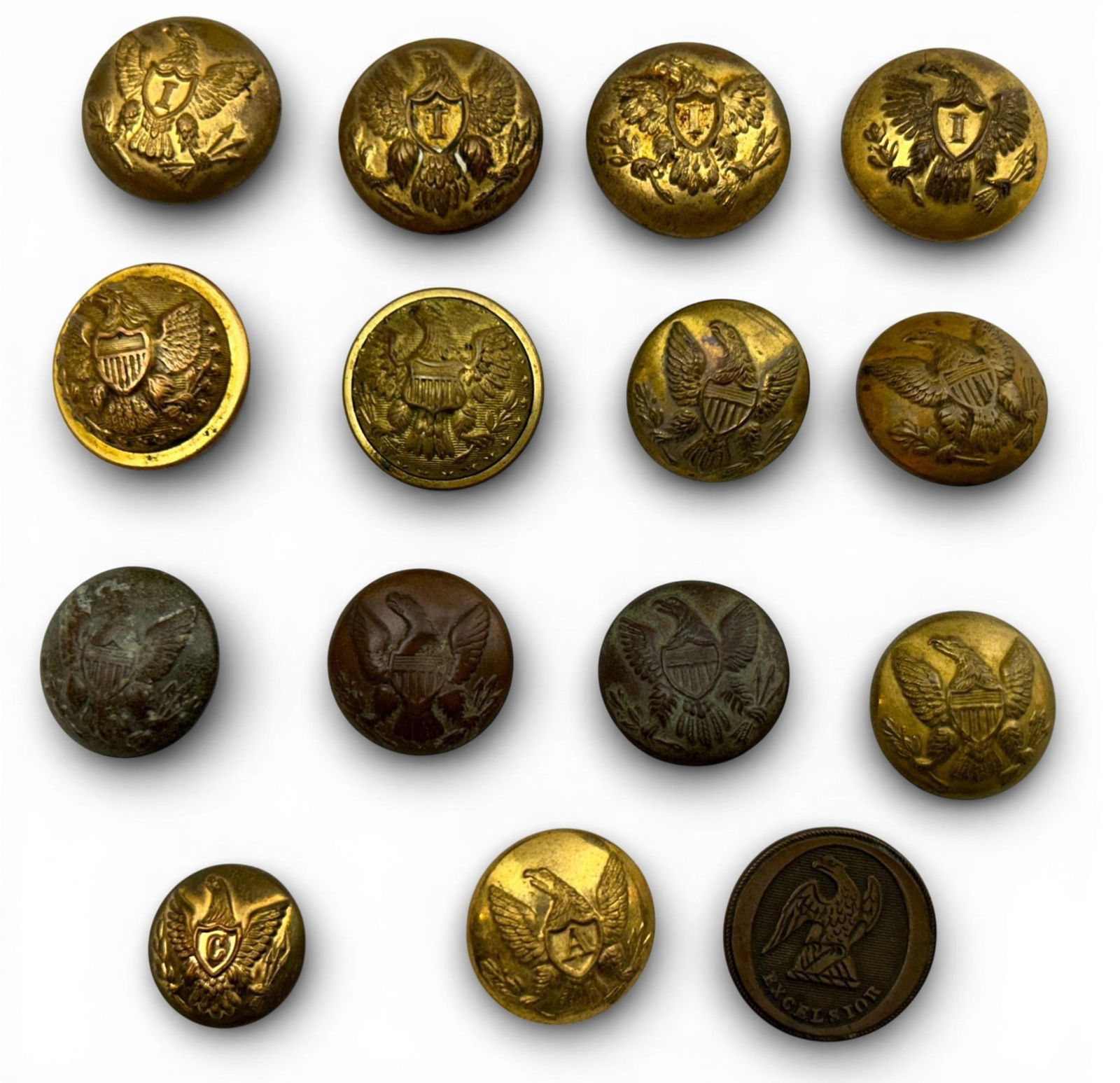 Civil War Union Uniform Button Lot - 15 Buttons: Civil War Union uniform button lot. All buttons have correct Civil War period backmarks. This lot includes 4 Infantry "I" eagle coat buttons, 1 artillery "A" eagle coat button, 1 Cavalry "C" cuff