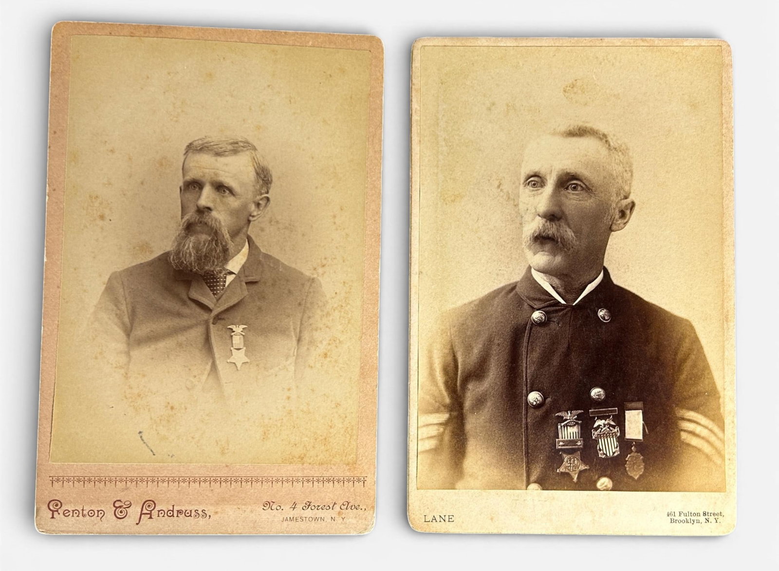 Civil War G. A. R. New York Veteran Cabinet Card Photograph lot - Veterans Wearing GAR Badges: Two G.A.R. cabinet cards featuring New York veterans wearing GAR medals. The first card features a veteran wearing a Grand Army of the Republic veteran's coat with G.A.R. buttons. He wears three GAR b