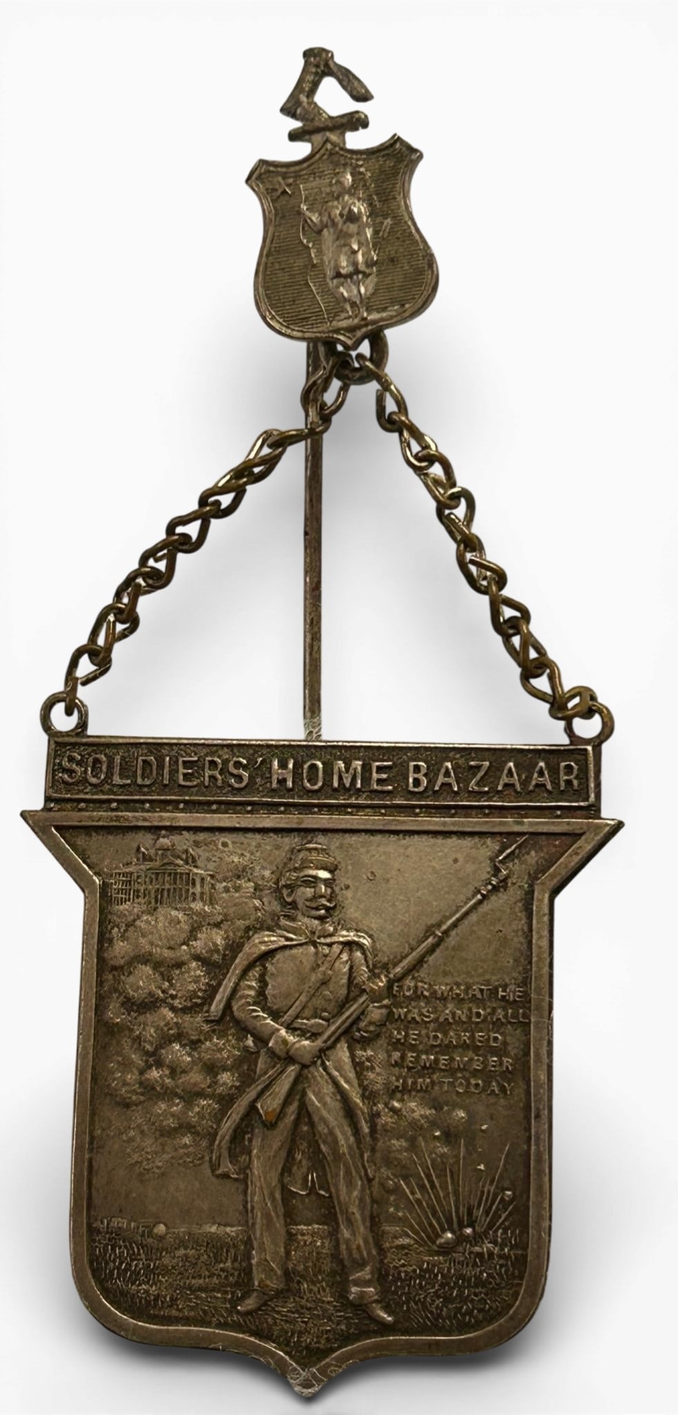 Massachusetts Civil War Veterans Soldiers' Home Bazaar Badge - Medal: Circa 1880s Massachusetts Civil War Soldiers' Home Bazaar pin - badge for a bazaar held to benefit Civil War veterans housed at the Massachusetts Soldiers' home in Chelsea. The badge's suspension devi