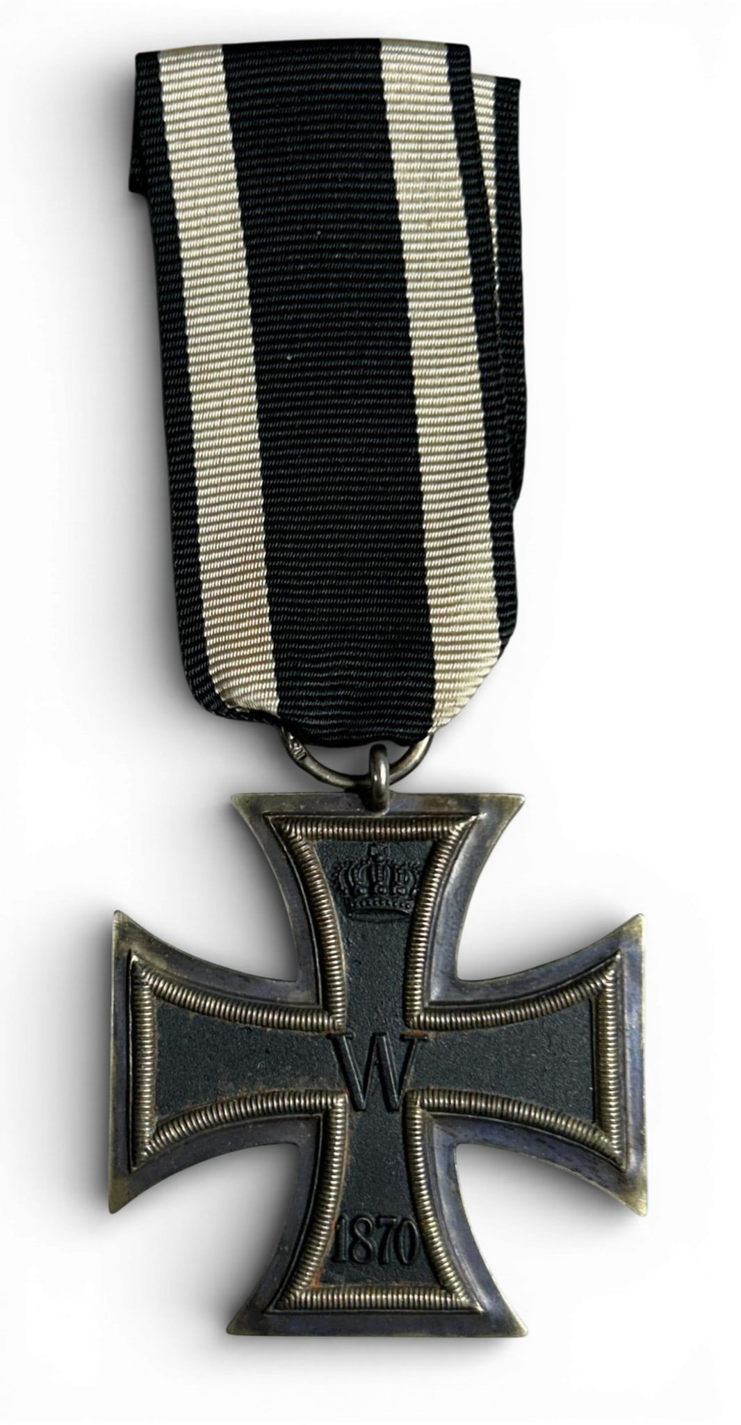 Imperial German Pre WWI 2nd Class 1870 Iron Cross Medal: Imperial German Pre WWI 2nd Class 1870 Iron Cross Decoration. Measures 1 3/4" x 1 3/4". The front of the maltese cross shows King’s crown on the upper arm with a ‘W’ in the center. It is dated �