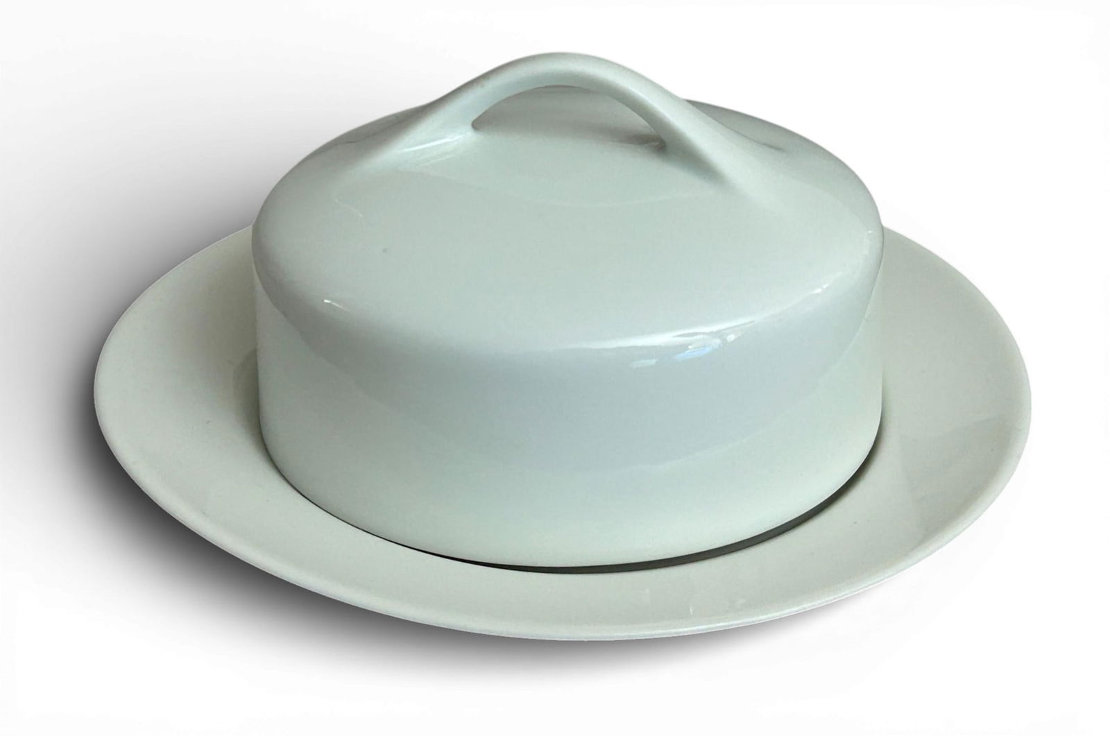 WWII Nazi German Kriegsmarine 1941 Porcelain Butter Dish by KPM: World War Two Nazi German Kriegsmarine butter dish and cover. The obverse is plain and the reverse of the dish has an eagle clutching a swastika over "M", 1941 date maker's mark KPM. Overall excellent