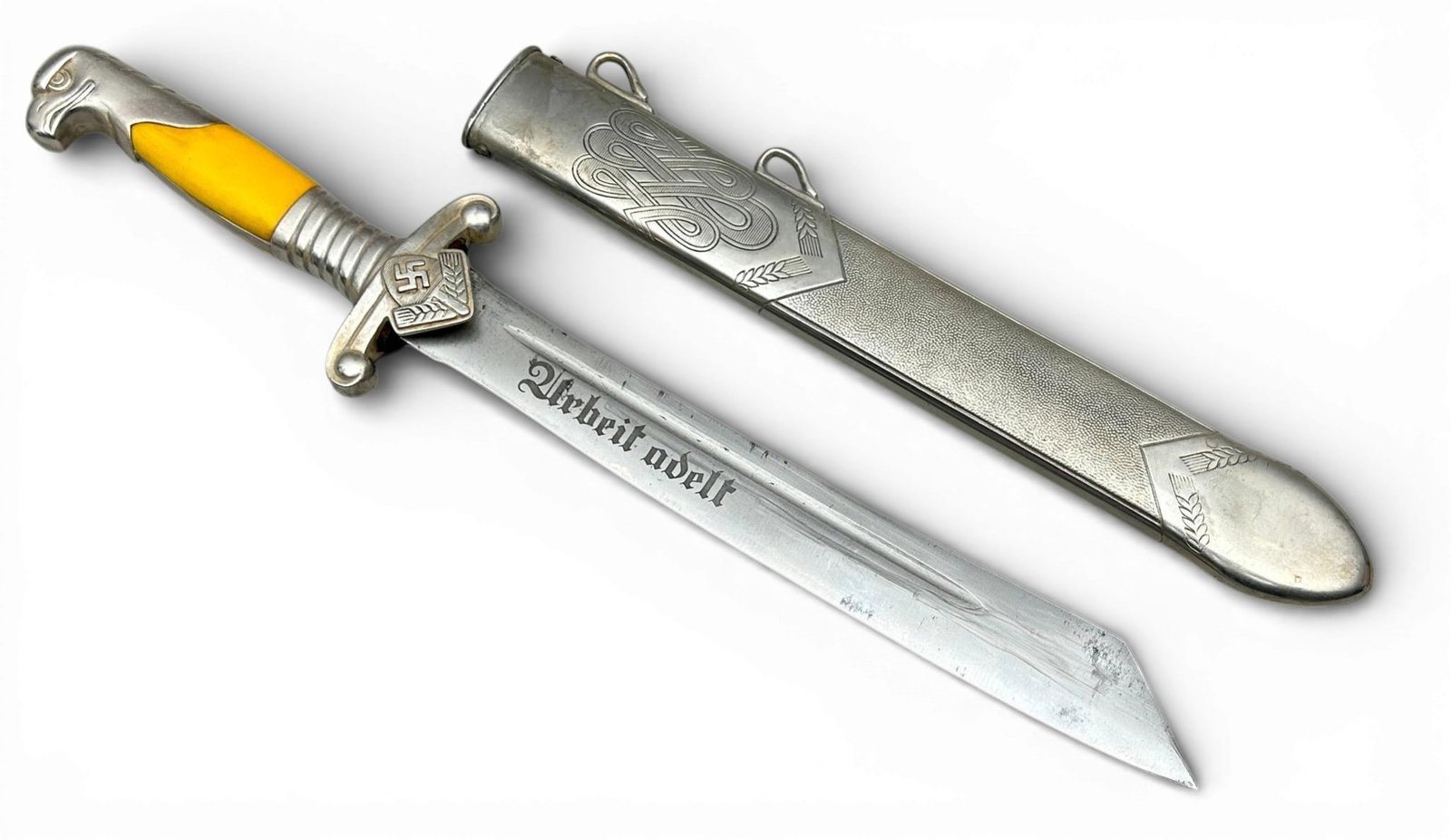 WWII Nazi German RAD Labor Corps Officers Dagger & Scabbard: German WWII RAD Labor Korps Officers dagger & scabbard. Measures 15.75" overall with scabbard. The etched steel blade reads ‘Arbeit adelt’ (Work enables). The ricasso is maker marked ‘ORIGINAL E