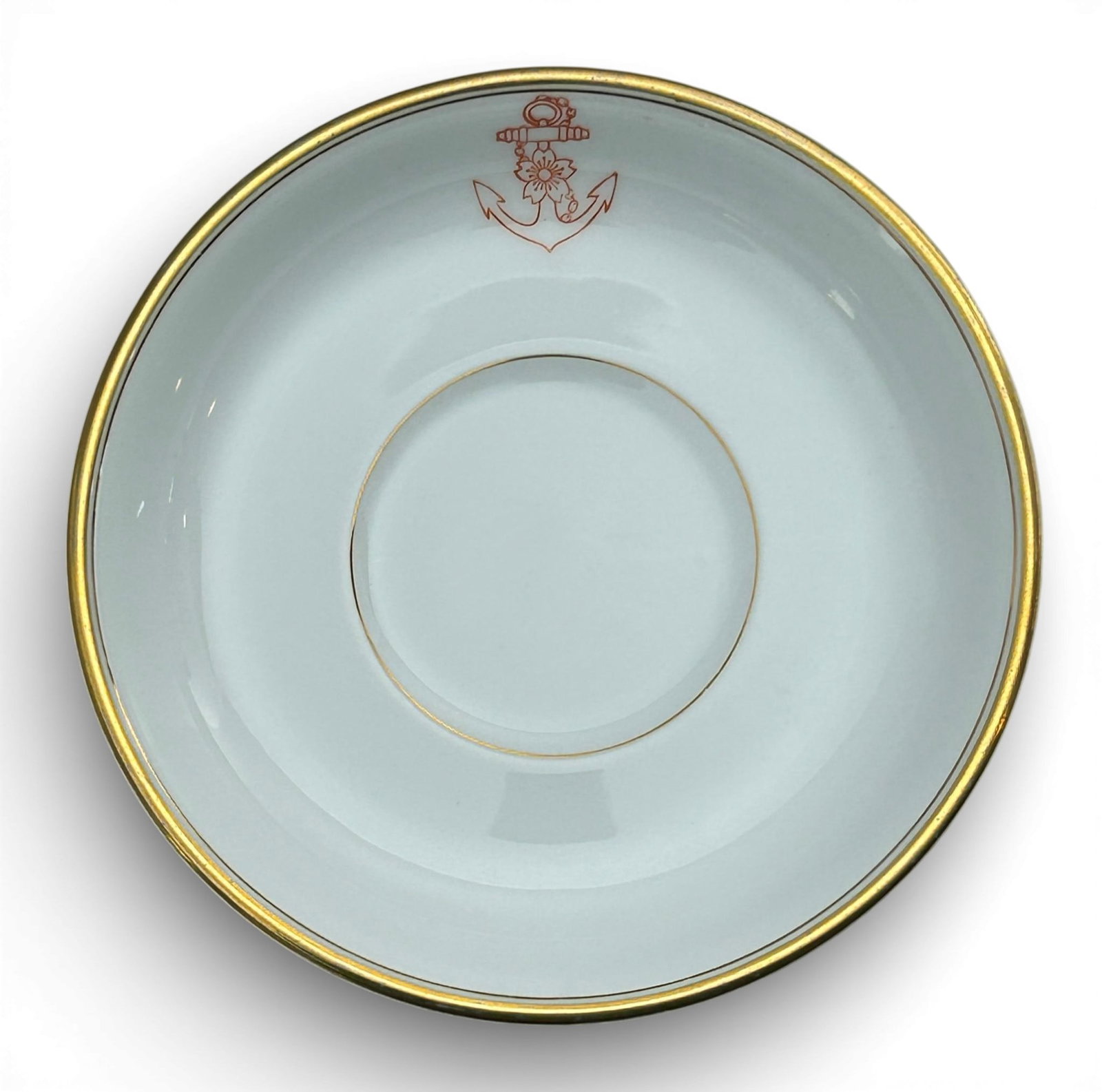 Pre WWII - WW2 Imperial Japanese Navy Dinnerware Saucer by Toyo Toki Kaisha: Near mint - mint condition Pre World War Two - WW2 Imperial Japanese Navy dinnerware saucer with the IJN Anchor with fouled chain and cherry blossom insignia. Toyo Toki Kaisha manufacturer mark on the