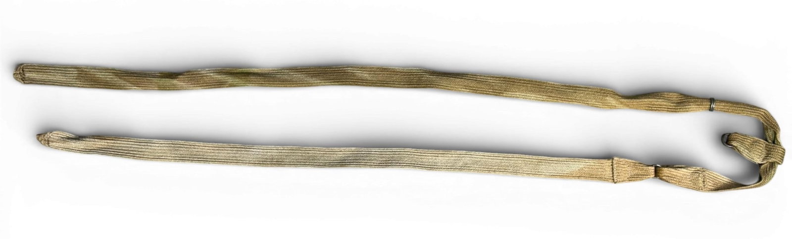 WWII Japanese Type 90 Army Helmet Cloth Chin Strap: Japanese World War II Army Type 90 helmet cloth chin strap. Measures 53” x by 3/4”. Includes the three round steel rings for attaching on the inside of the helmet shell. Tan woven cloth ca