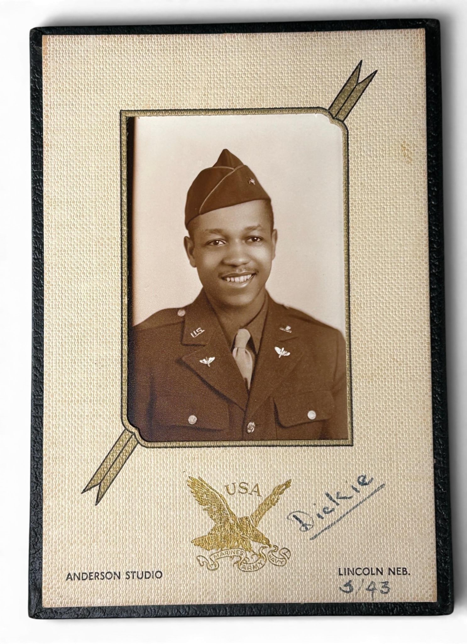 WWII U.S. Army Air Force AAF1943 Photograph of African American - Black Airman - Tuskegee ?: World War Two photograph of an African American - black soldier in uniform with Army Air Force Insignia. Photograph taken at "Anderson Studio" in Lincoln, Nebraska. Image is identified "Dickie" and ei