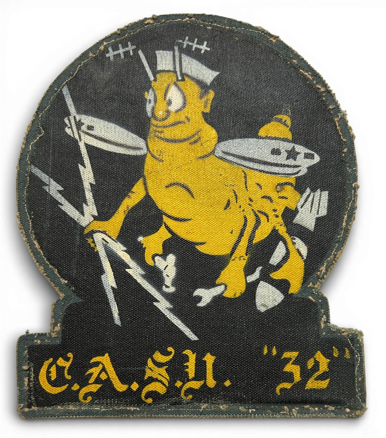WWII U.S. Navy CASU-32 Patch Carrier Air Service Unit: World War Two United States Navy Carrier Aircraft Support Unit 32 squadron patch. This patch is painted on canvas and was removed from a jacket. Measures 6.5" x 8". During 1943-1945 CASU 32 was