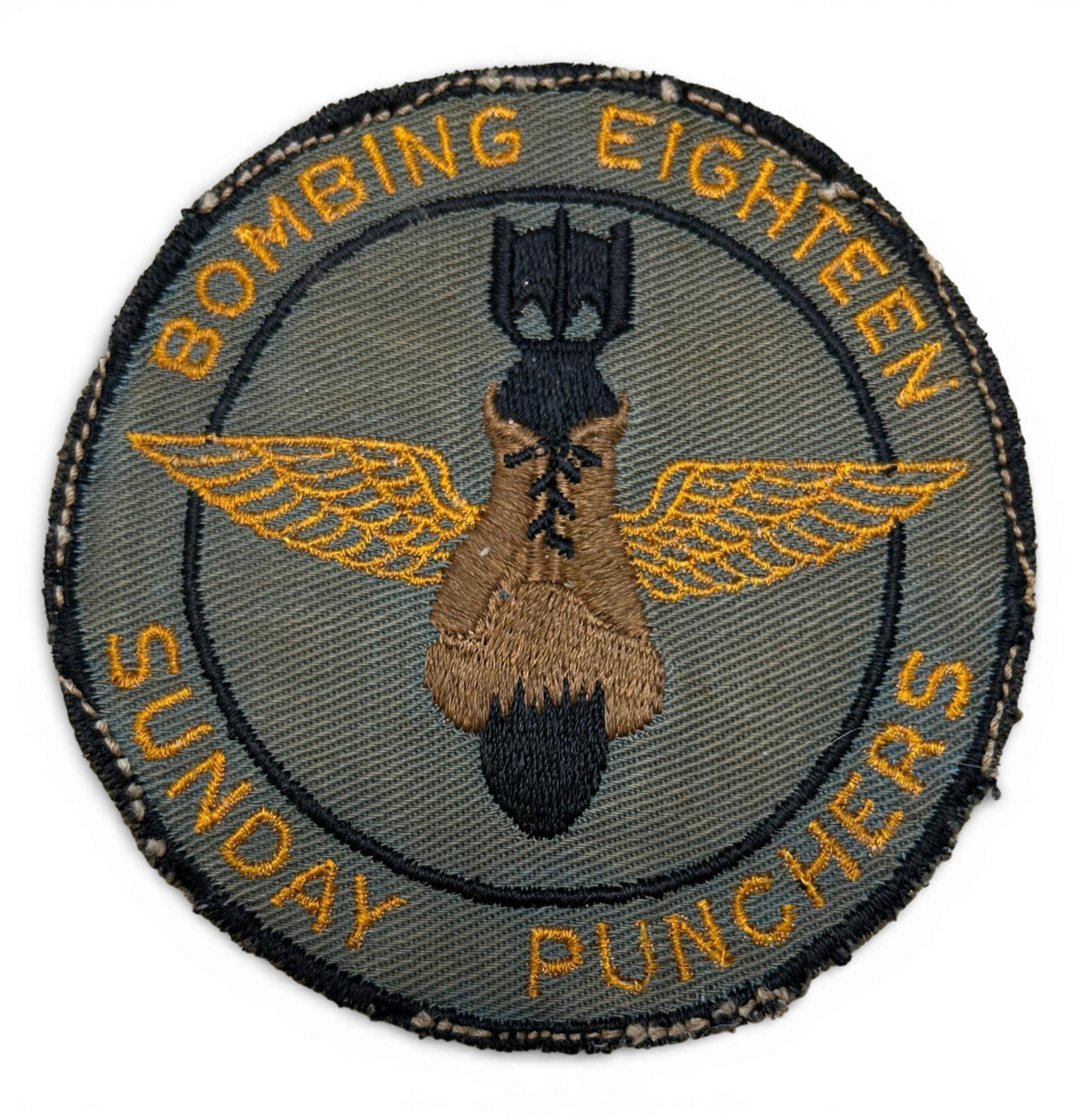 WWII U.S. Navy VB-18 Bombing Squadron Patch: World War Two U.S. Navy Bombing Squadron Eighteen "Sunday Punchers" (VB-18) squadron patch. The squadron was established on July 20, 1943. The patch is schiffli embroidery on twill and was removed