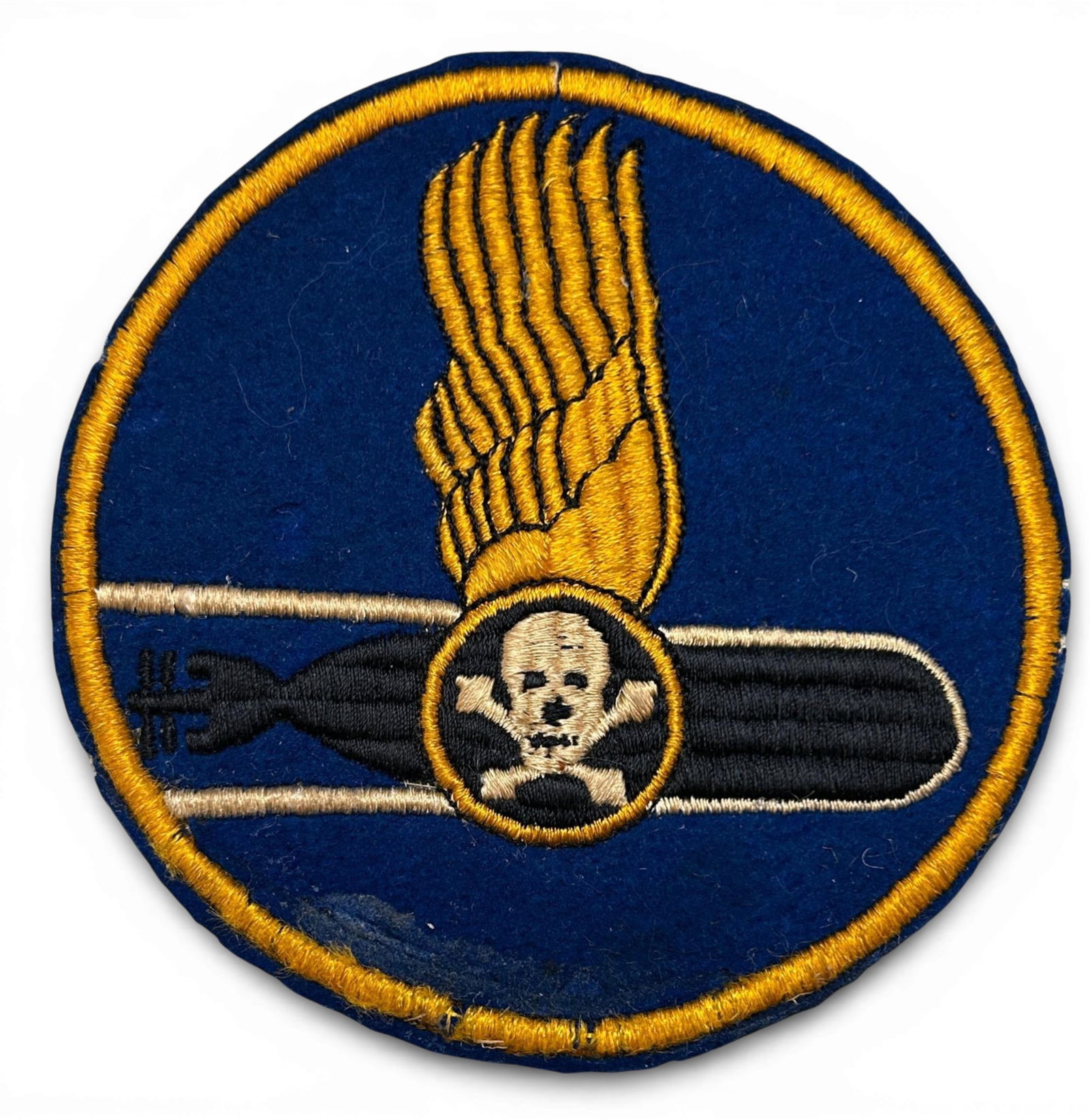 WWII U.S. Navy VT-46 Torpedo Squadron Patch: World War Two U.S. Navy Torpedo Squadron Forty Six (VT-46) squadron patch. The patch is schiffli embroidery on wool. Measures 4.75" in diameter. The squadron was established on April 15, 1944. The