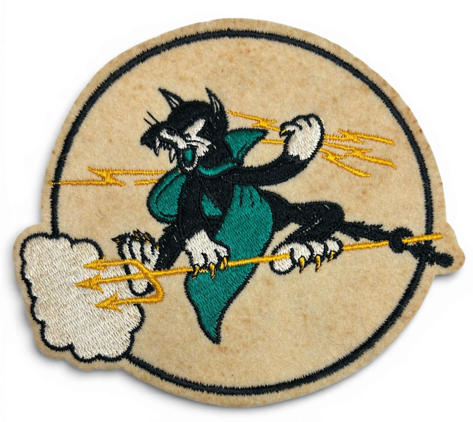 WWII U.S. Navy VF-19 Fighter Squadron Patch: World War Two U.S. Navy VF-19 squadron patch. The patch is schiffli embroidery on wool. Measures 5.125' in diameter excluding the cloud and kitten's tail. Established as Fighter Squadron Nineteen