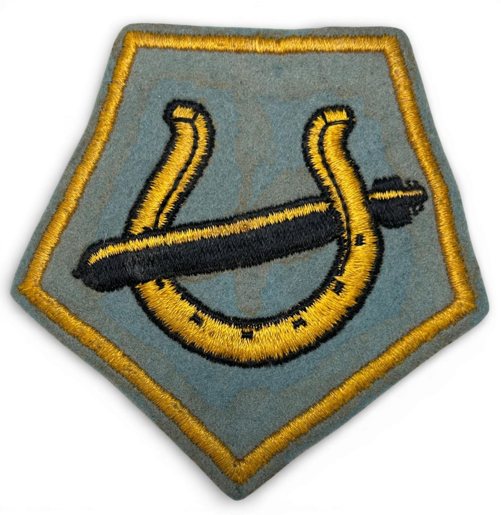 WWII U.S. Navy VT-7 Torpedo Squadron Patch: World War Two U.S. Navy VT-7 squadron patch. The patch is schiffli embroidery on wool. Measures 4.125" x 3.75". Established as Torpedo Squadron Seven VT-7 on January 3, 1944. The insignia was