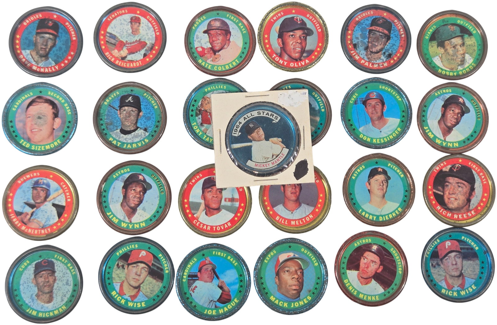 Collection of 25 Vintage Topps Baseball Coins Featuring 1964 Mickey Mantle All-Stars #131 and 1971: This lot features a diverse collection of 25 vintage metal baseball coins produced by Topps (T.C.G.). The centerpiece of the collection is a 1964 Topps All-Stars Mickey Mantle coin (#131), a highly