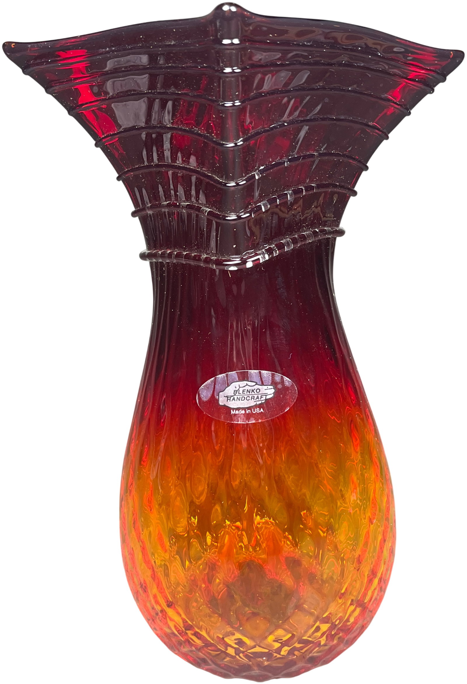 Blenko Tangerine Diamond Optic and Wrap Vase 1110W-18: This Blenko Glass Company #1110W vase, manufactured in Milton, West Virginia, is executed in the Tangerine colorway, characterized by a gradient transition from deep ruby red at the rim to bright oran