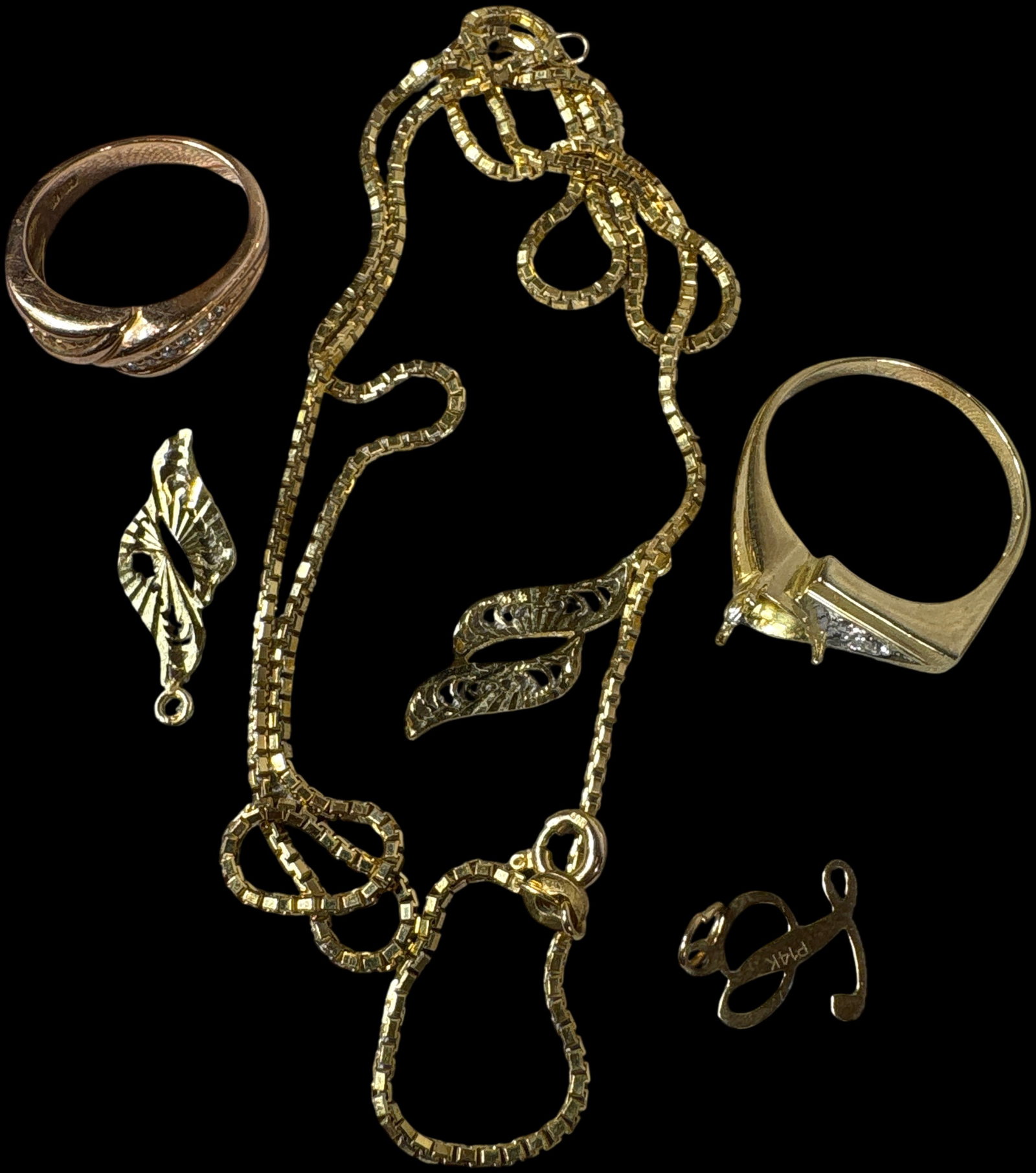 An Assortment of 14 Karat Yellow and Rose Gold Jewelry, 15.58 Grams: An assortment of jewelry featuring various pieces in 14 karat yellow and rose gold. The collection includes a fine yellow gold box chain necklace and two openwork pendants, one in a scrolled motif and