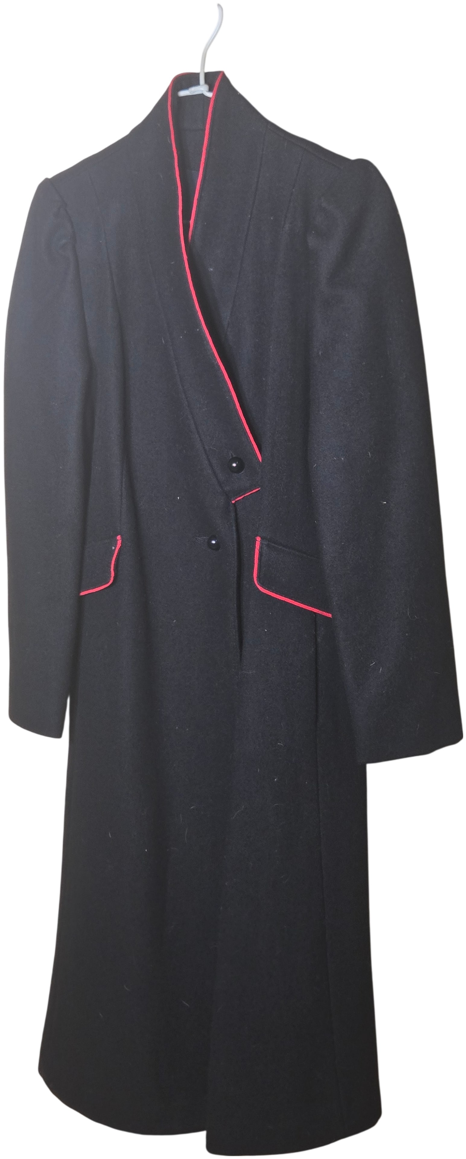 Vintage 1980s Women's Military-Inspired Full-Length Overcoat with Red Piping, Made in U.S.A.: This garment is a full-length, structured overcoat dating to the 1980s. It is constructed from a heavyweight black wool or wool-blend felt and is fully lined with a dark synthetic fabric. The coat