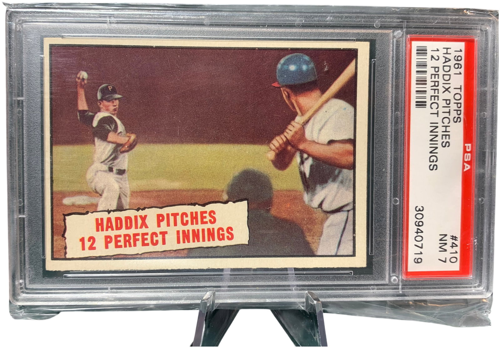 1961 Topps Baseball Thrills #410 Harvey Haddix Pitches 12 Perfect Innings PSA NM 7: This is a 1961 Topps baseball card featuring Pittsburgh Pirates pitcher Harvey Haddix, designated as card number 410. Part of the Baseball Thrills subset, it commemorates the historic May 26, 1959, ga