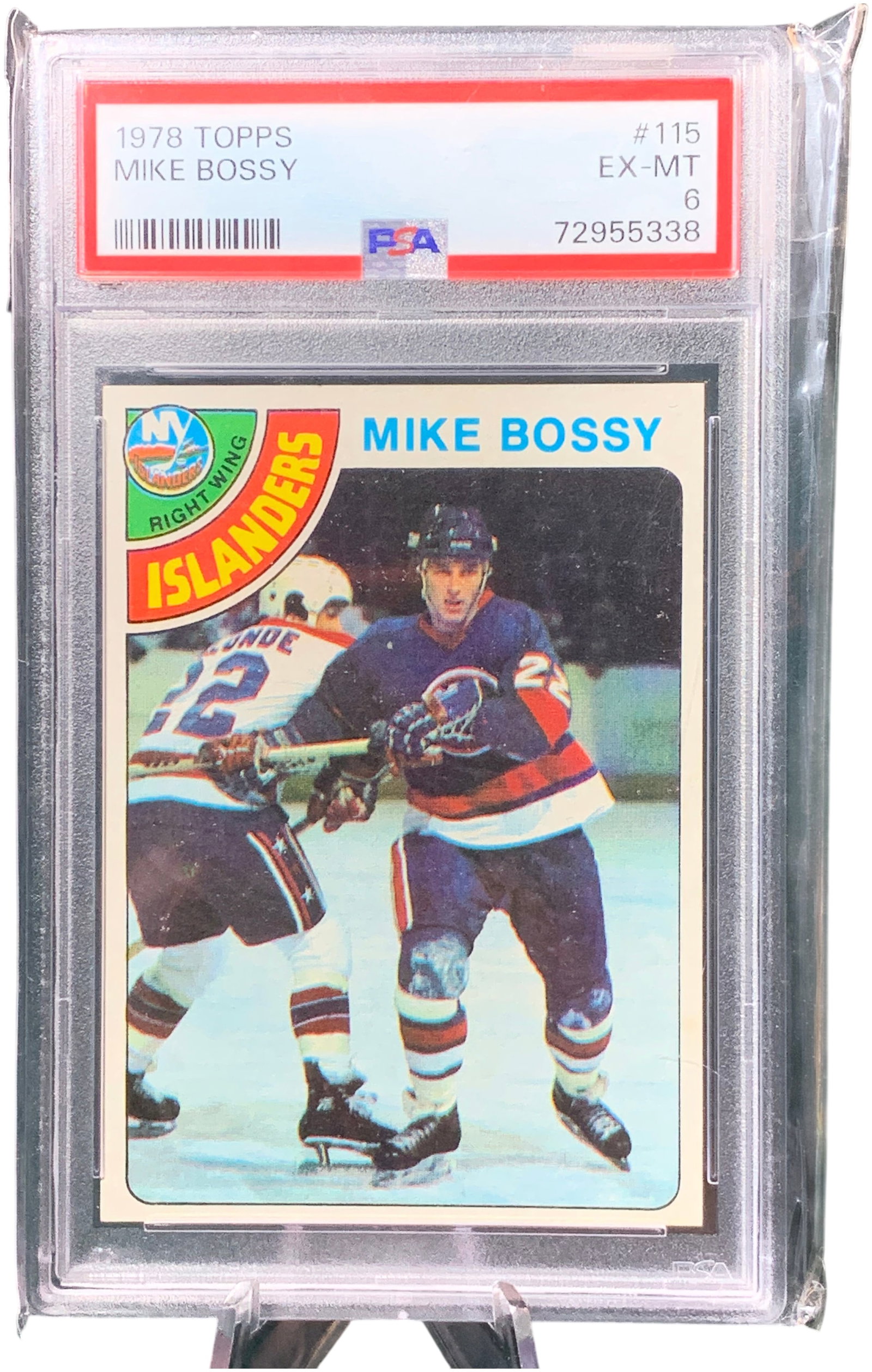 1978 Topps Mike Bossy Rookie Card #115 PSA 6 EX-MT: This is a 1978 Topps hockey card featuring Mike Bossy, card number 115, which is recognized as his rookie card. Bossy is a Hockey Hall of Fame member known for his career with the New York Islanders. 