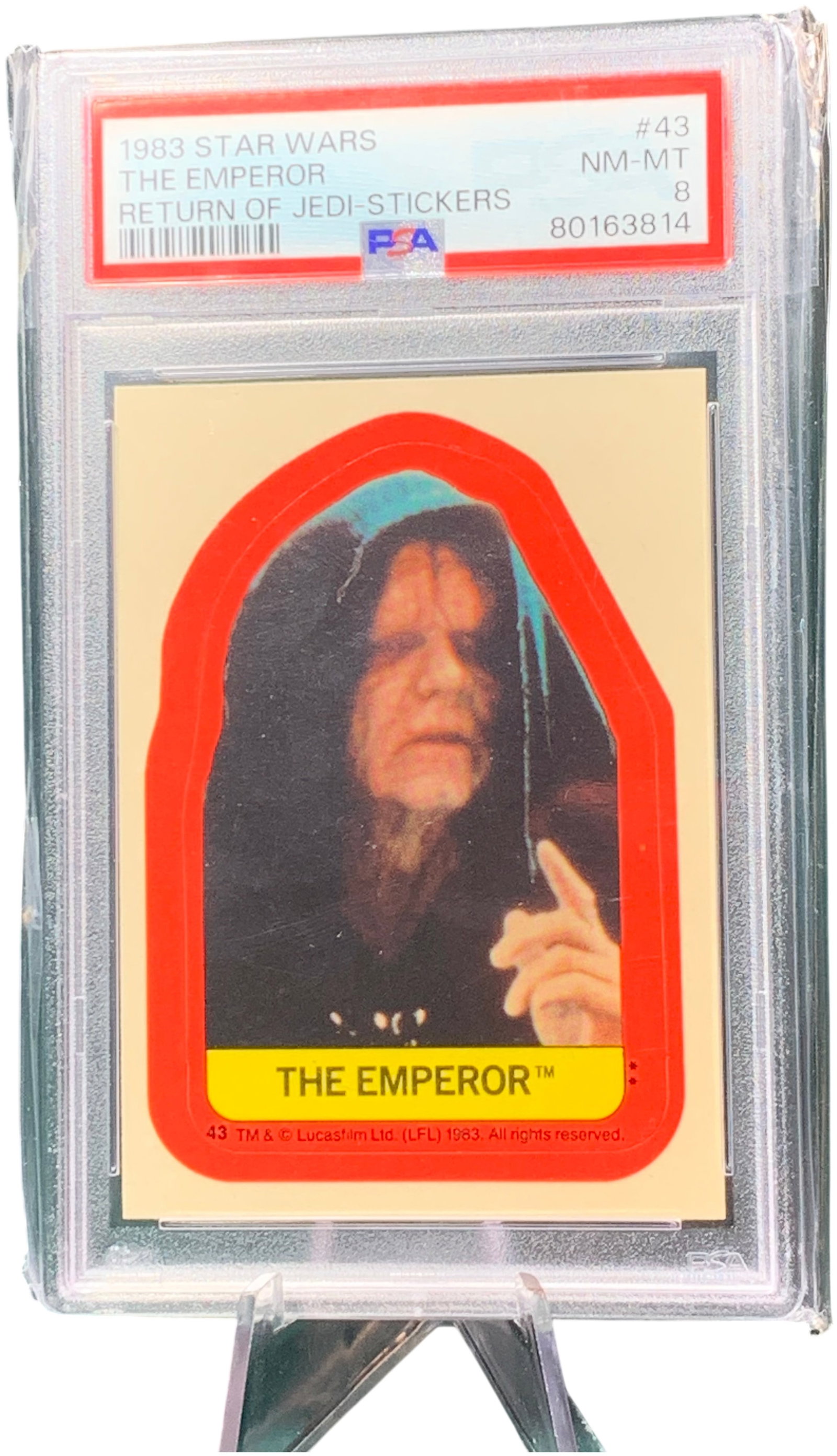 1983 Topps Star Wars Return of the Jedi Sticker #43 The Emperor PSA 8 NM-MT: This is a vintage non-sport trading card sticker from the 1983 Topps Star Wars: Return of the Jedi series. The item features card number 43, titled The Emperor. The front of the card displays a photog