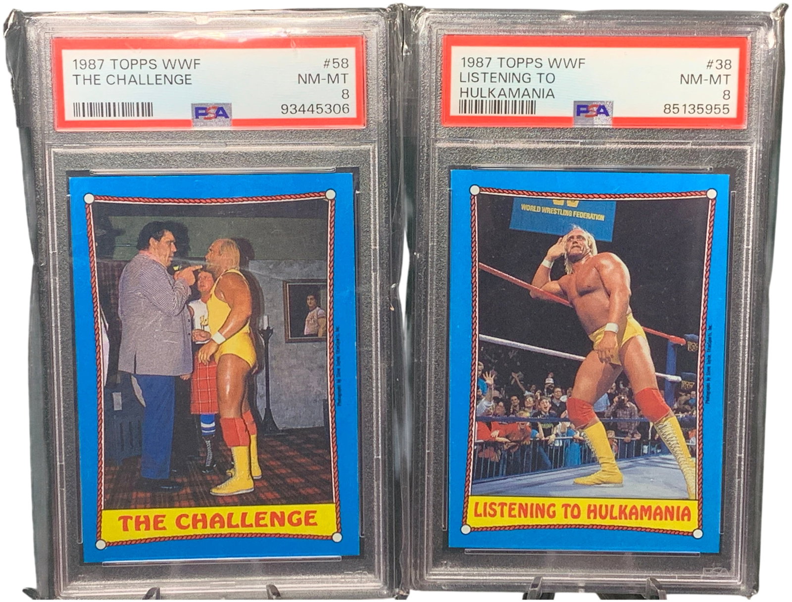 A Pair of 1987 Topps WWF Hulk Hogan Cards Listening to Hulkamania #38 and The Challenge #58 PSA 8: This lot features professionally graded trading cards from the 1987 Topps World Wrestling Federation (WWF) series, both showcasing Hall of Fame wrestler Hulk Hogan. The first card, titled The Challeng