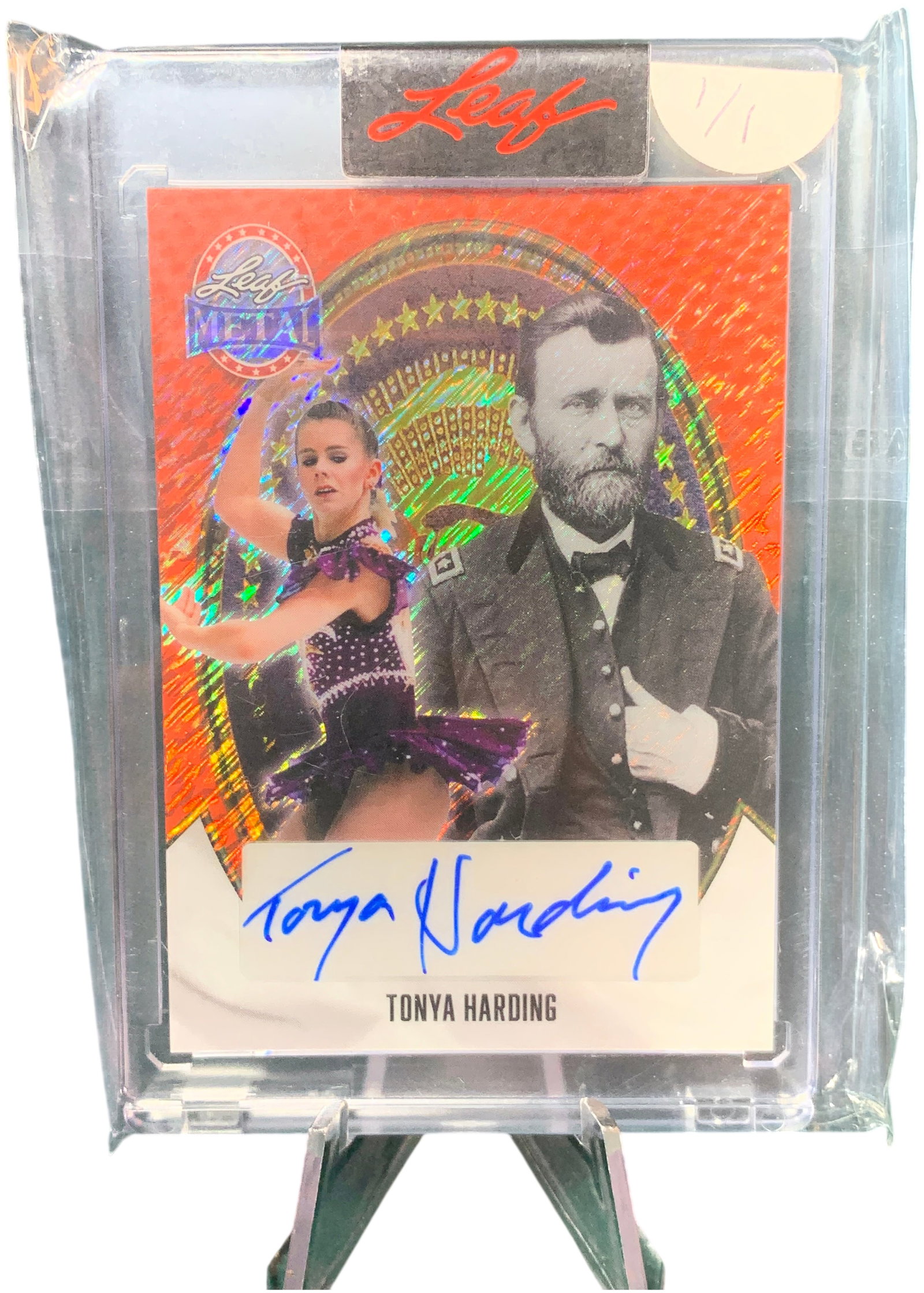 2024 Leaf Metal Tonya Harding One-of-One Autograph Trading Card: This 2024 Leaf Metal trading card features figure skater Tonya Harding and is identified as a unique one-of-one (1/1) edition. The obverse of the card features an orange refractive prismatic backgroun