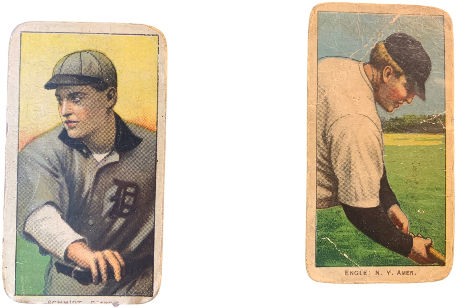 1909-1911 T206 White Border Baseball Cards Boss Schmidt and Clyde Engle Sweet Caporal Backs: This lot consists of original color lithograph baseball cards from the 1909-1911 T206 White Border series, issued by the American Tobacco Company with Sweet Caporal Cigarettes. The first card features