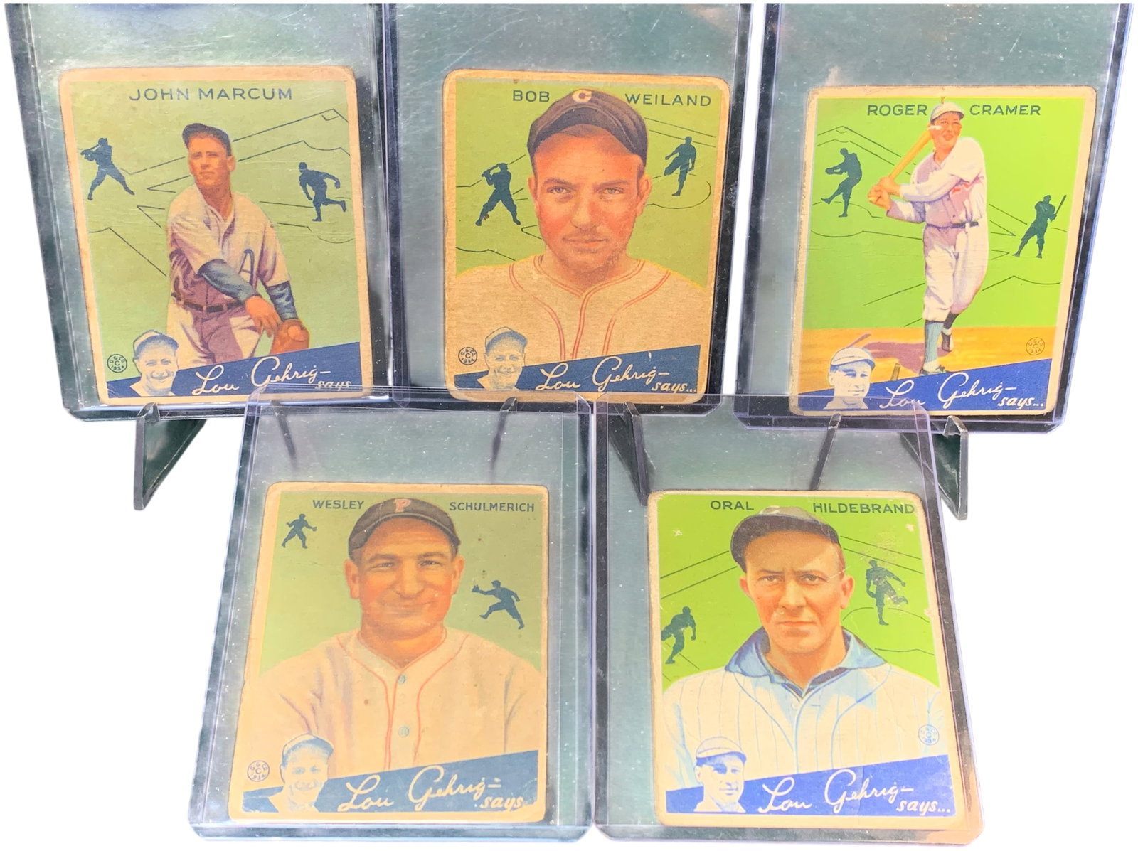 A Collection of Five 1934 Goudey Big League Chewing Gum Baseball Cards: This lot contains a group of authentic 1934 Goudey Big League Chewing Gum baseball cards from the Lou Gehrig says series. Each card front displays a colorized player image with a blue banner at the bo