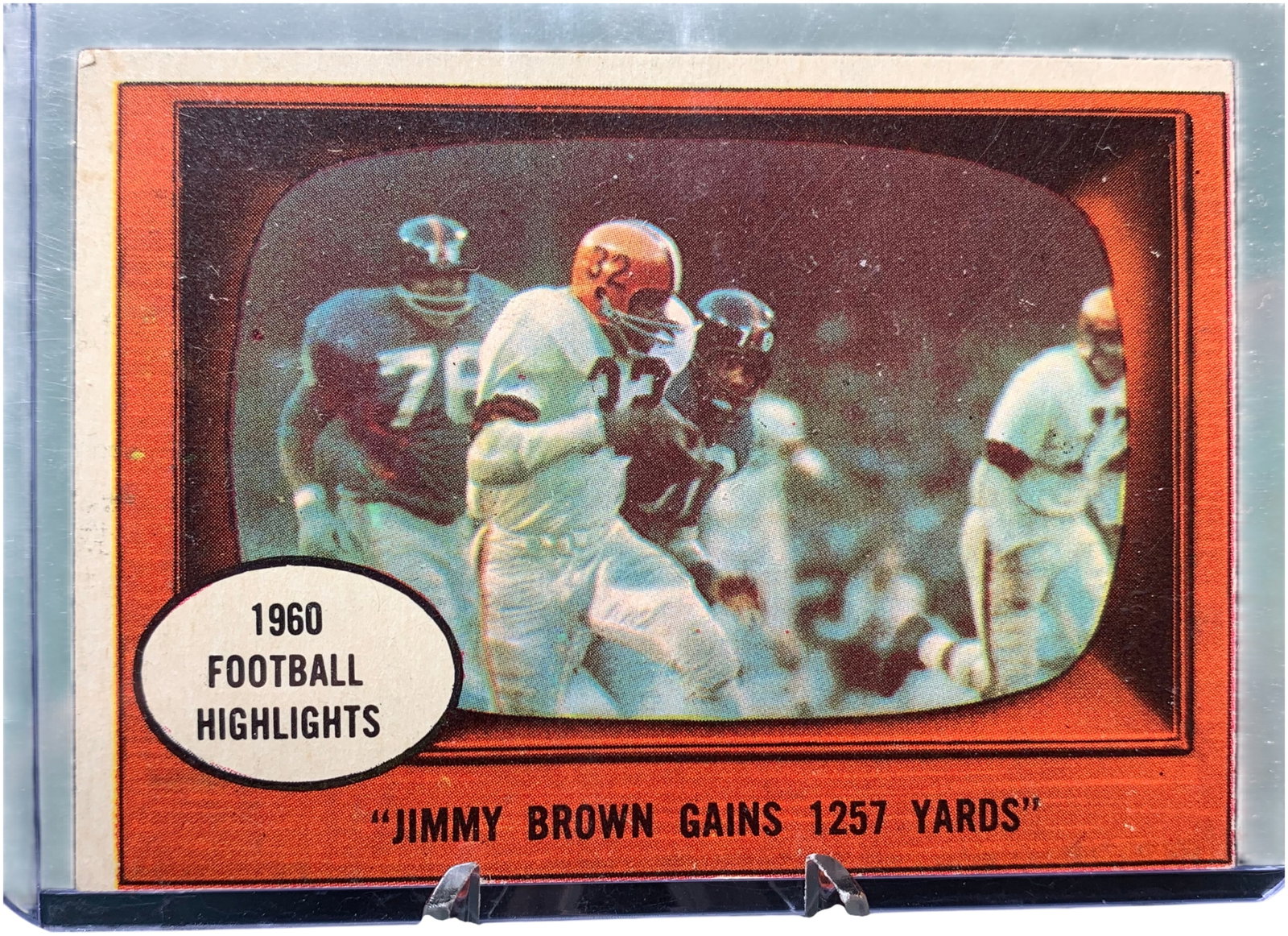 1961 Topps Football #77 Jimmy Brown: This 1961 Topps football trading card features Hall of Famer Jimmy Brown. The card is identified as number 77 in the set and is part of the 1960 Football Highlights subset. The front features a color 