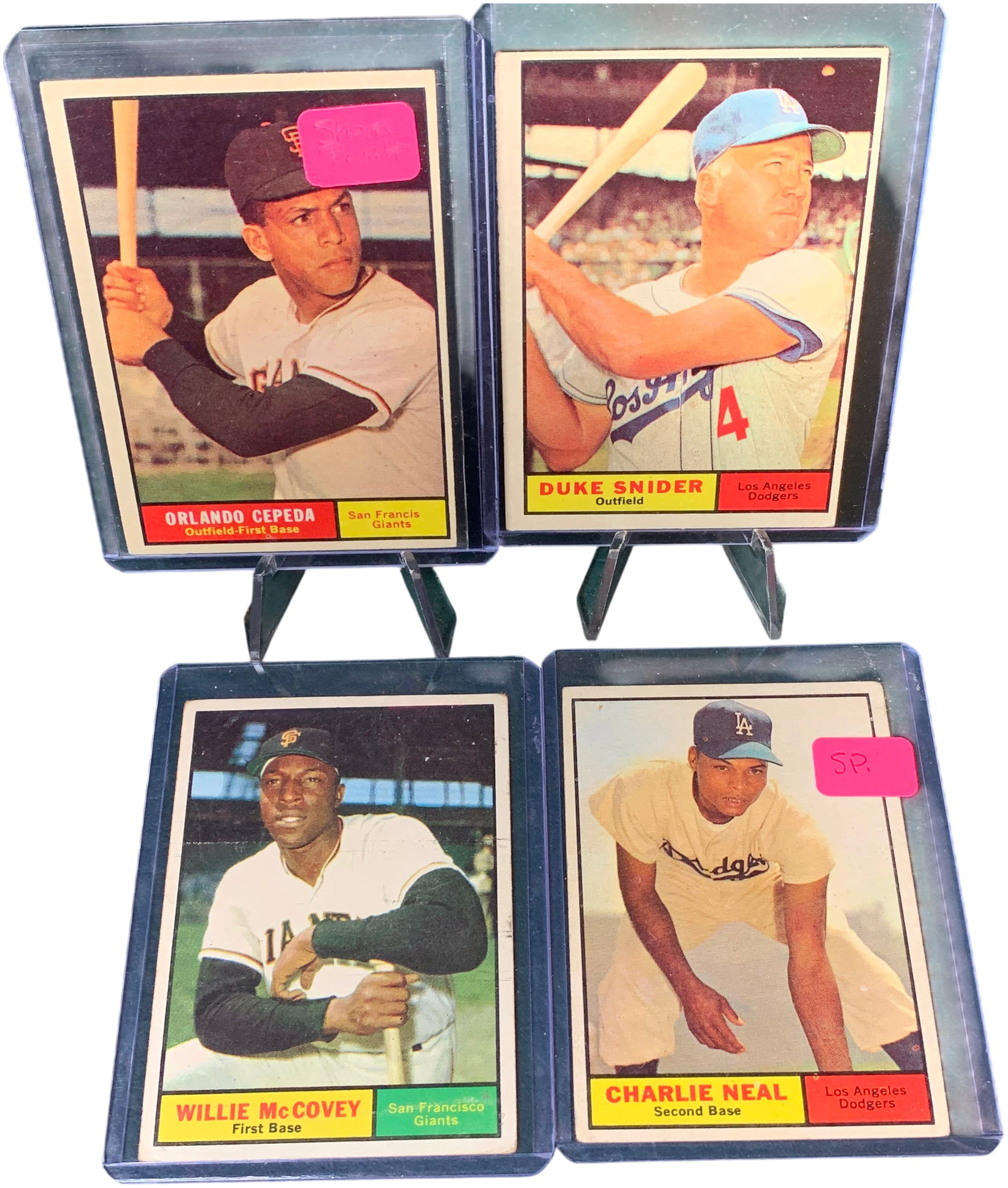A Group of Four 1961 Topps Baseball Cards Including Willie McCovey, Duke Snider, and Orlando Cepeda: This group of vintage baseball cards was produced by Topps for the 1961 baseball season. The assortment features Hall of Fame inductees and notable players from the Los Angeles Dodgers and San Francis