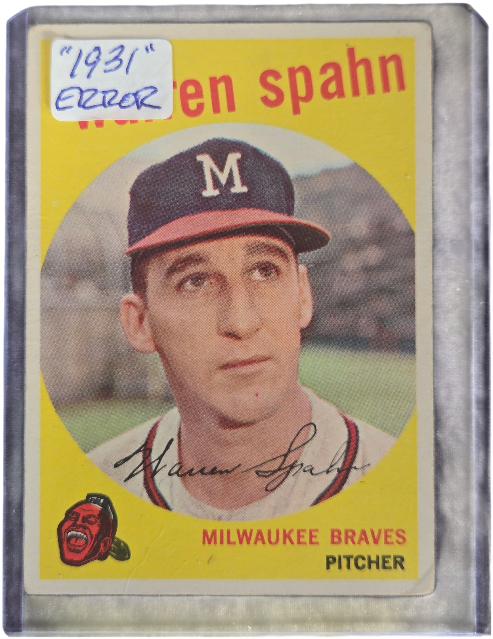 1959 Topps Warren Spahn Milwaukee Braves Card #40: This vintage 1959 Topps baseball card features Hall of Fame pitcher Warren Spahn of the Milwaukee Braves, designated as card number 40. The front displays a circular color portrait of Spahn against a 