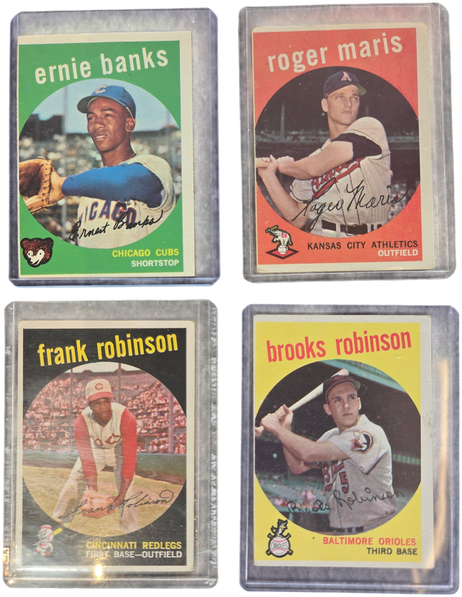 A Group of Four 1959 Topps Baseball Cards Including Roger Maris, Ernie Banks, Frank Robinson, and (1 of 9)